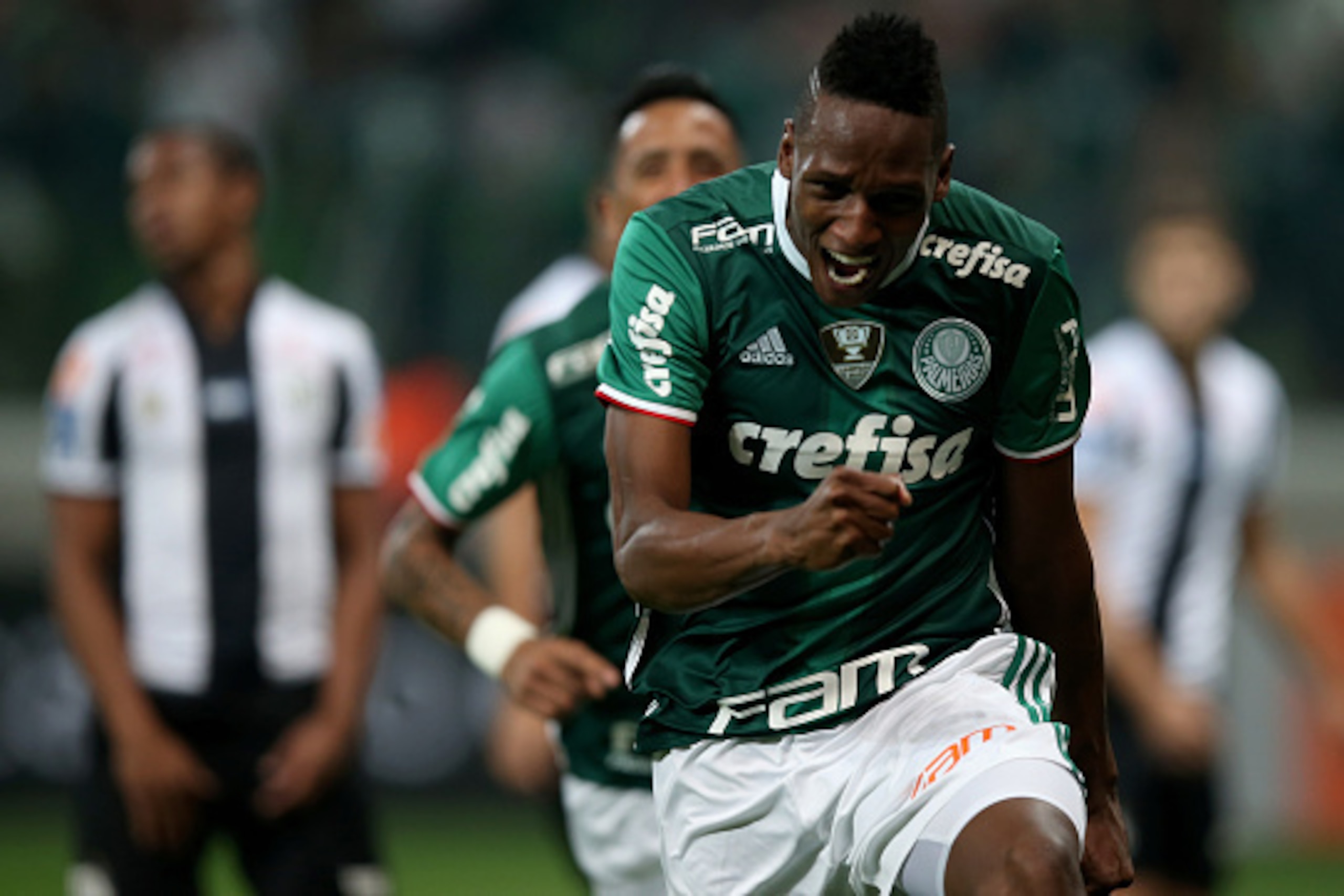 SAO PAULO, BRAZIL - JULY 12: Yerry Mina of Palmeiras celebrates scoring the first goal during the match between Palmeiras and Santos for the Brazilian Series A 2016 at Allianz Parque on July 12, 2016 in Sao Paulo, Brazil. (Photo by Friedemann Vogel/Gett SAO PAULO, BRAZIL - JULY 12: Yerry Mina of Palmeiras celebrates scoring the first goal during the match between Palmeiras and Santos for the Brazilian Series A 2016 at Allianz Parque on July 12, 2016 in Sao Paulo, Brazil. (Photo by Friedemann Vogel/Gett