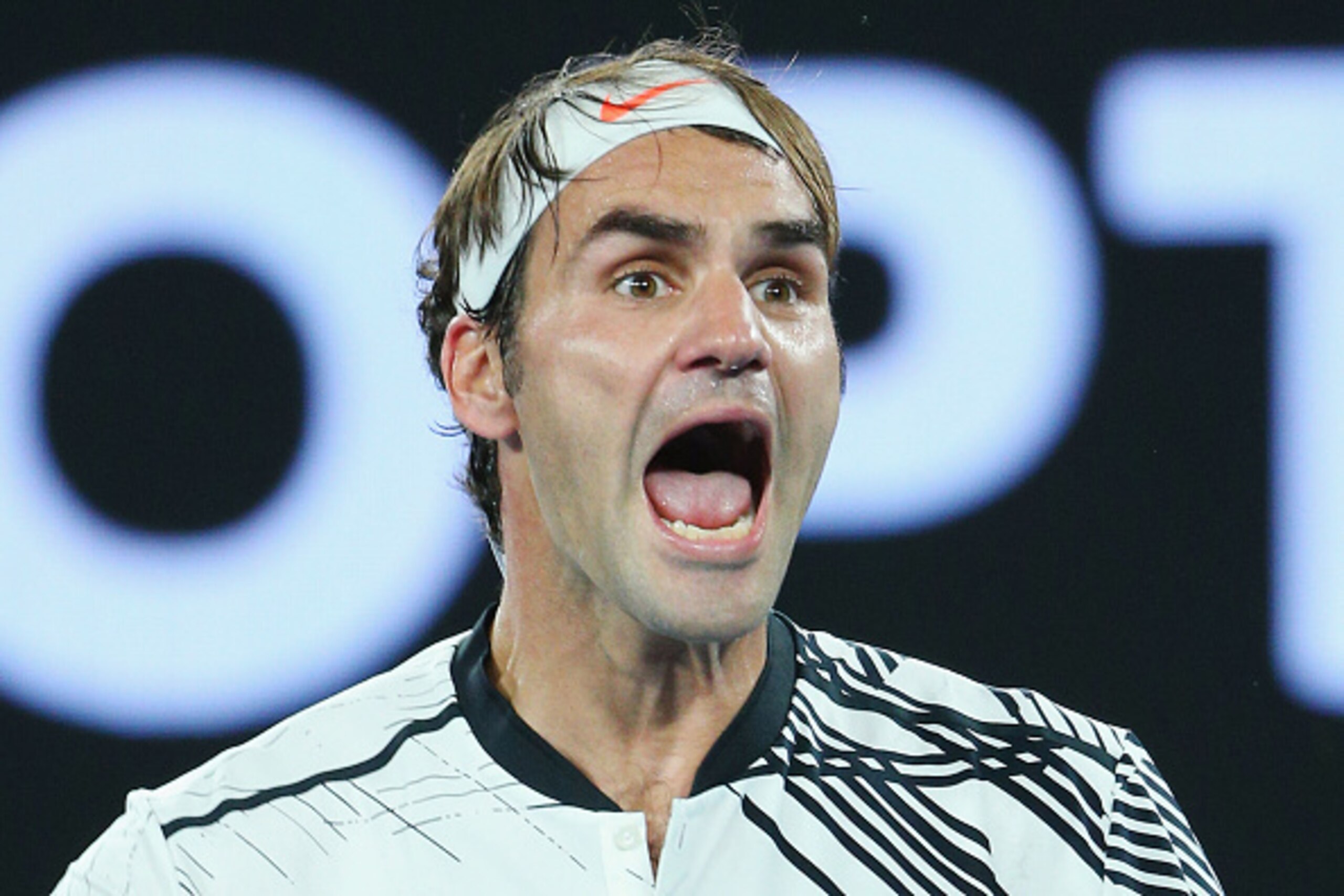 MELBOURNE, AUSTRALIA - JANUARY 22: Roger Federer of Switzerland celebrates winning in his fourth round match against Kei Nishikori of Japan on day seven of the 2017 Australian Open at Melbourne Park on January 22, 2017 in Melbourne, Australia. (Photo by MELBOURNE, AUSTRALIA - JANUARY 22: Roger Federer of Switzerland celebrates winning in his fourth round match against Kei Nishikori of Japan on day seven of the 2017 Australian Open at Melbourne Park on January 22, 2017 in Melbourne, Australia. (Photo by