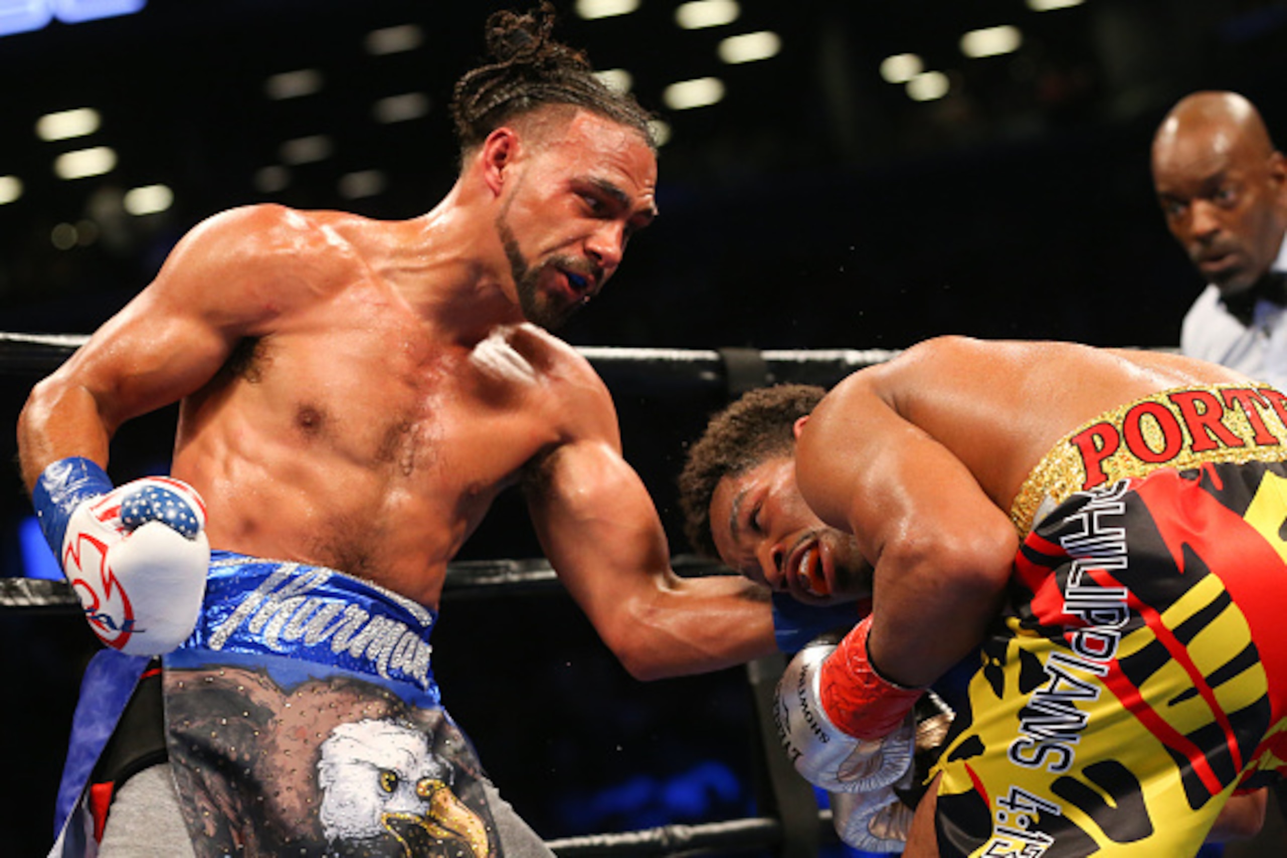 BROOKLYN, NY - JUNE 25: Keith Thurman (left) lands a left hand to the head of Shawn Porter (right) during their 12 round WBA welterweight championship bout at the Barclays Center on June 25, 2016 in the Brooklyn borough of New York City. (Photo by Ed Mulh