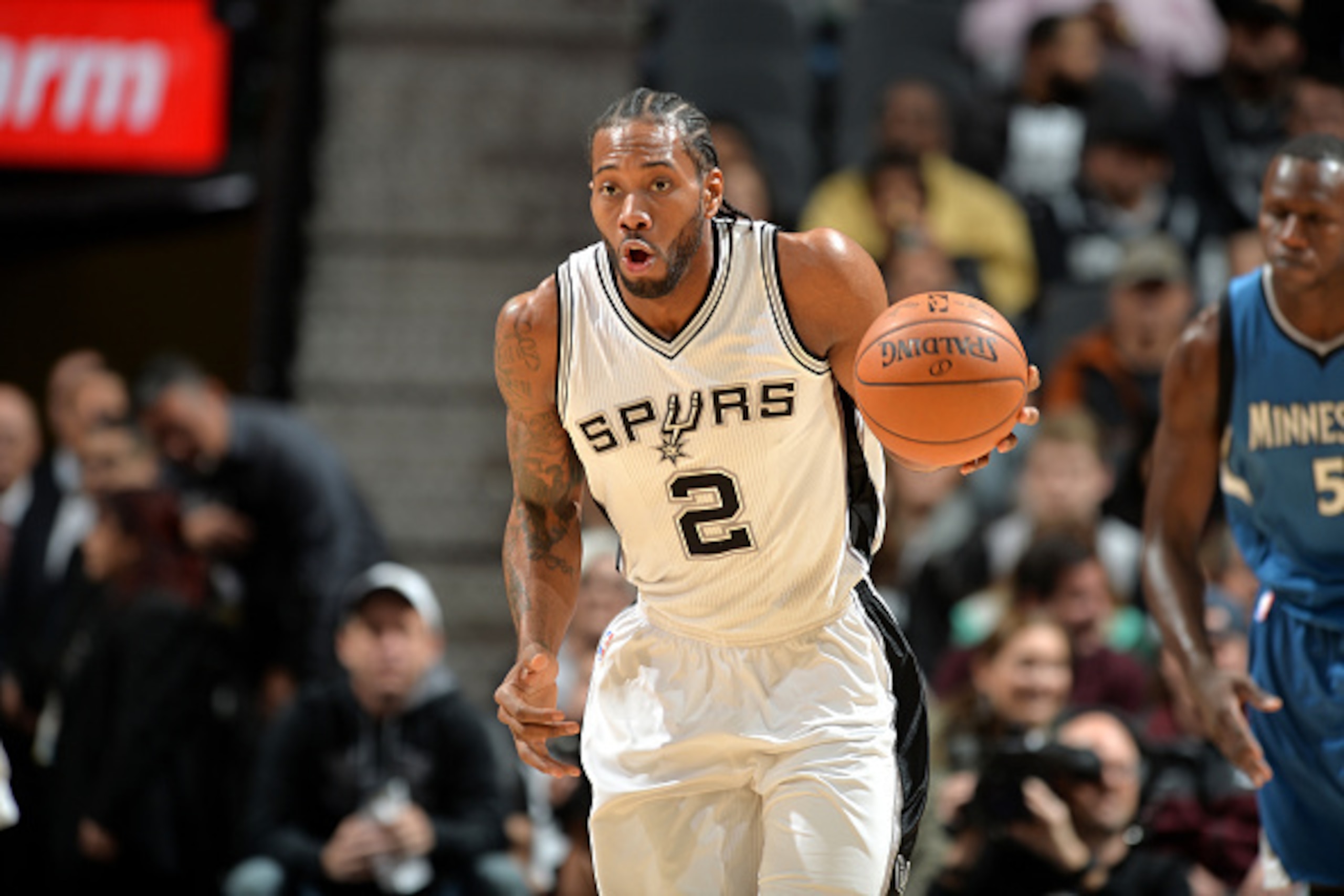 SAN ANTONIO, TX - JANUARY 17: Kawhi Leonard #2 of the San Antonio Spurs handles the ball during the game against the Minnesota Timberwolves on January 17, 2017 at the AT&T Center in San Antonio, Texas. NOTE TO USER: User expressly acknowledges and agrees 