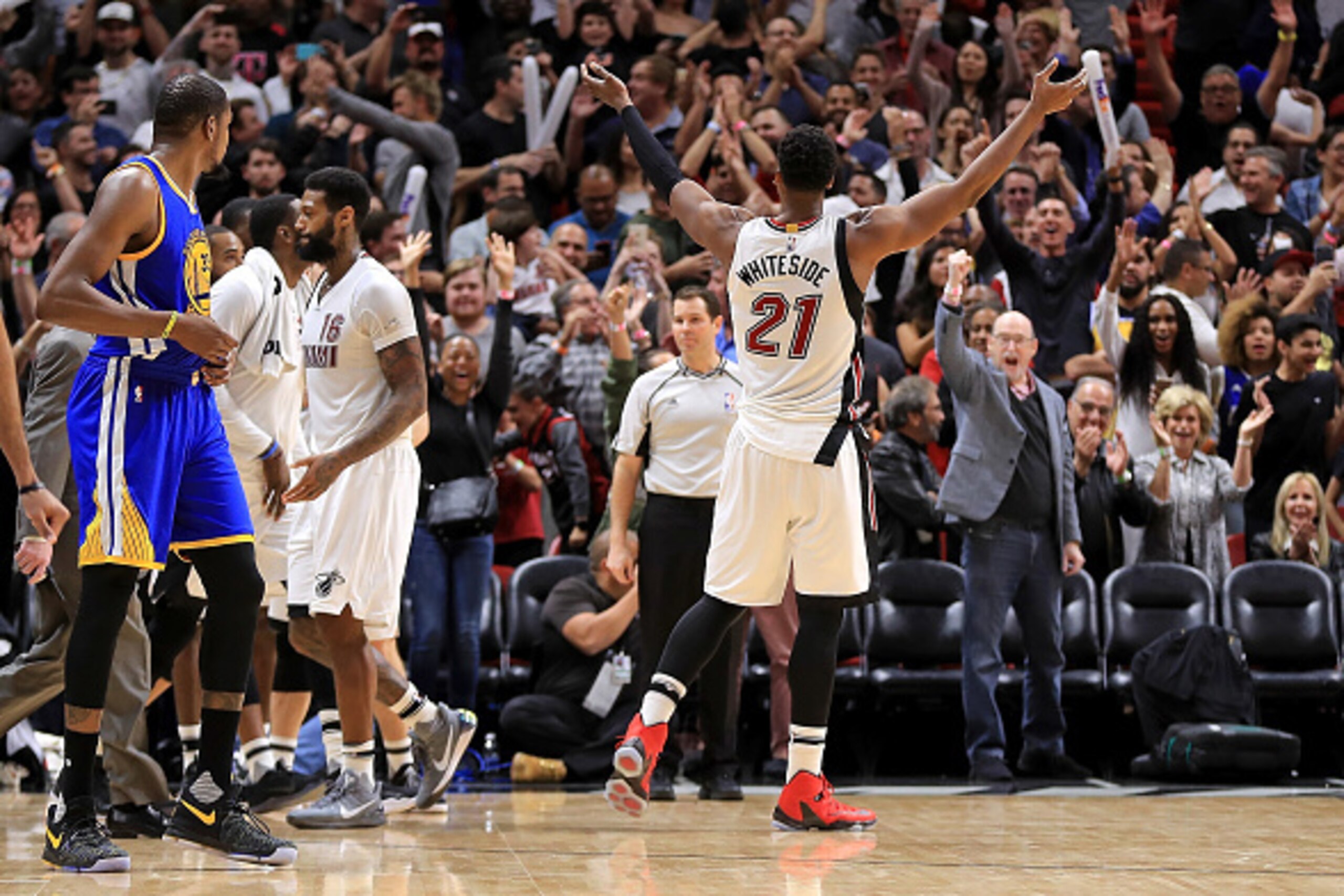 MIAMI, FL - JANUARY 23:  Hassan Whiteside #21 of the Miami Heat reacts to winning a game against the Golden State Warriors at American Airlines Arena on January 23, 2017 in Miami, Florida. NOTE TO USER: User expressly acknowledges and agrees that, by down