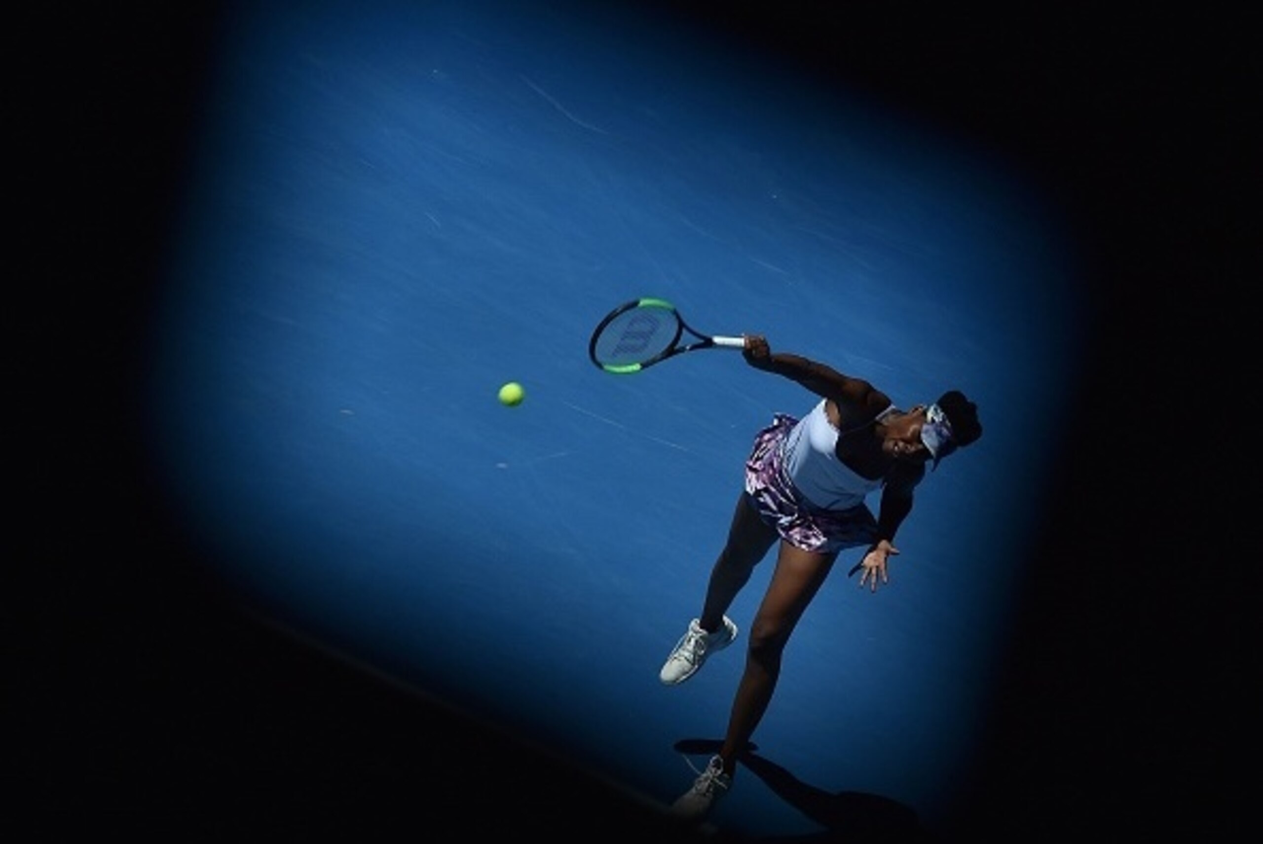 Venus Williams of the US hits a return against Russia's Anastasia Pavlyuchenkova during their women's singles quarter-final match on day nine of the Australian Open tennis tournament in Melbourne on January 24, 2017.  / AFP / PAUL CROCK / IMAGE RESTRICTED