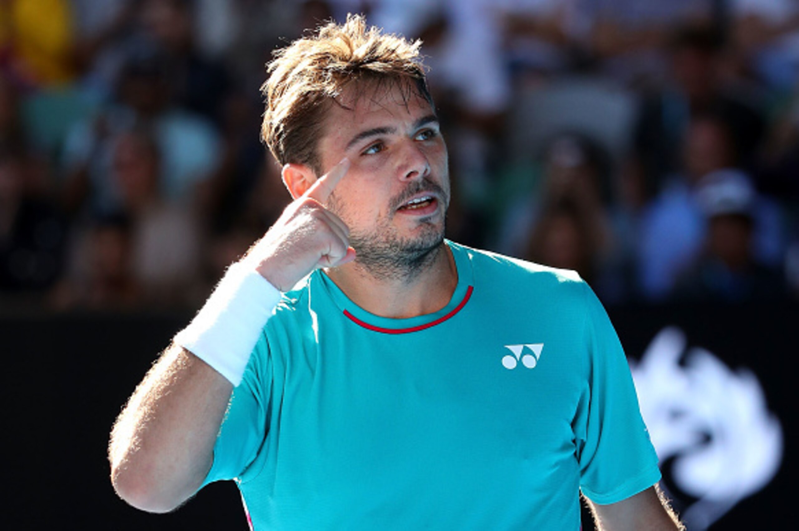 MELBOURNE, AUSTRALIA - JANUARY 24:  Stan Wawrinka of Switzerland celebrates winning his quarterfinal match against Jo-Wilfried Tsonga of France on day nine of the 2017 Australian Open at Melbourne Park on January 24, 2017 in Melbourne, Australia.  (Photo 