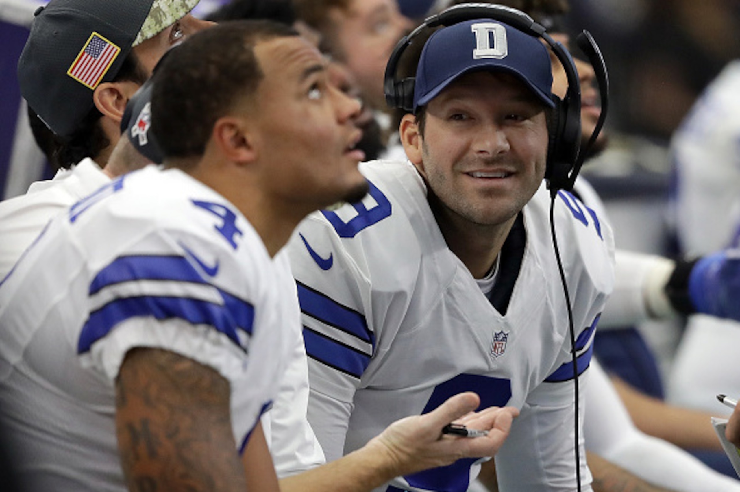 ARLINGTON, TX - NOVEMBER 20:   Tony Romo #9 talks with Dak Prescott #4 and Mark Sanchez #3 of the Dallas Cowboys on the bench during the first half of the game against the Baltimore Ravens at AT&T Stadium on November 20, 2016 in Arlington, Texas.  (Photo 