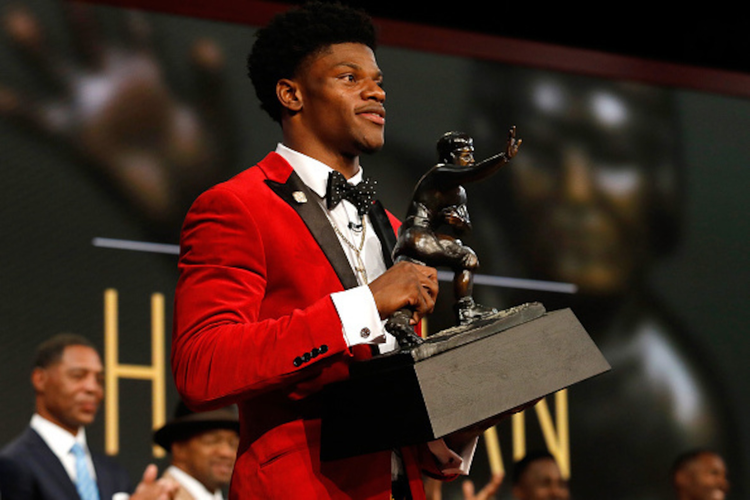NEW YORK, NY - DECEMBER 10:  Quarterback Lamar Jackson of the Louisville Cardinals poses with the trophy after being named the 82nd Heisman Memorial Trophy Award winner during the 2016 Heisman Trophy Presentation at the Best Buy Theater on December 10, 20