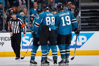 SAN JOSE, CA - JANUARY 16: Brent Burns #88 and Joe Thornton #19 of the San Jose Sharks celebrate after scoring a goal against the Winnipeg Jets at SAP Center on January 16, 2017 in San Jose, California. (Photo by Rocky W. Widner/NHL/Getty Images)