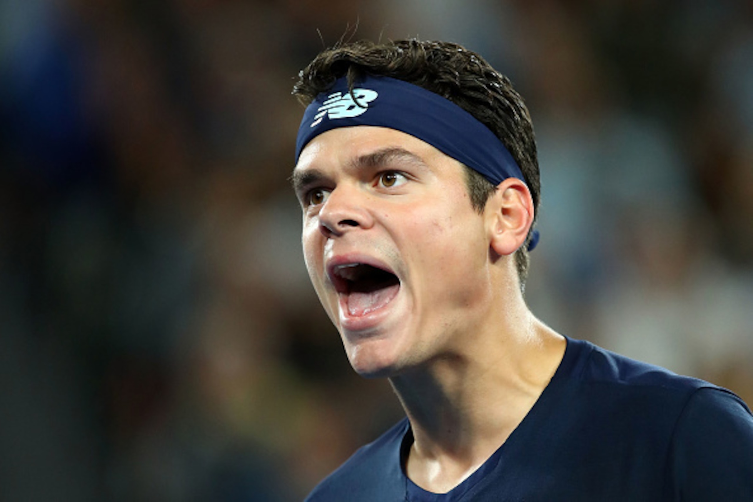MELBOURNE, AUSTRALIA - JANUARY 25:  Milos Raonic of Canada reacts in his quarterfinal match against Rafael Nadal of Spain on day 10 of the 2017 Australian Open at Melbourne Park on January 25, 2017 in Melbourne, Australia.  (Photo by Cameron Spencer/Getty