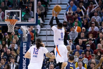 Jan 23, 2017; Salt Lake City, UT, USA; Oklahoma City Thunder guard Russell Westbrook (0) shoots the ball over Utah Jazz guard George Hill (3) during the second half at Vivint Smart Home Arena. Oklahoma City won 97-95. Mandatory Credit: Russ Isabella-USA T