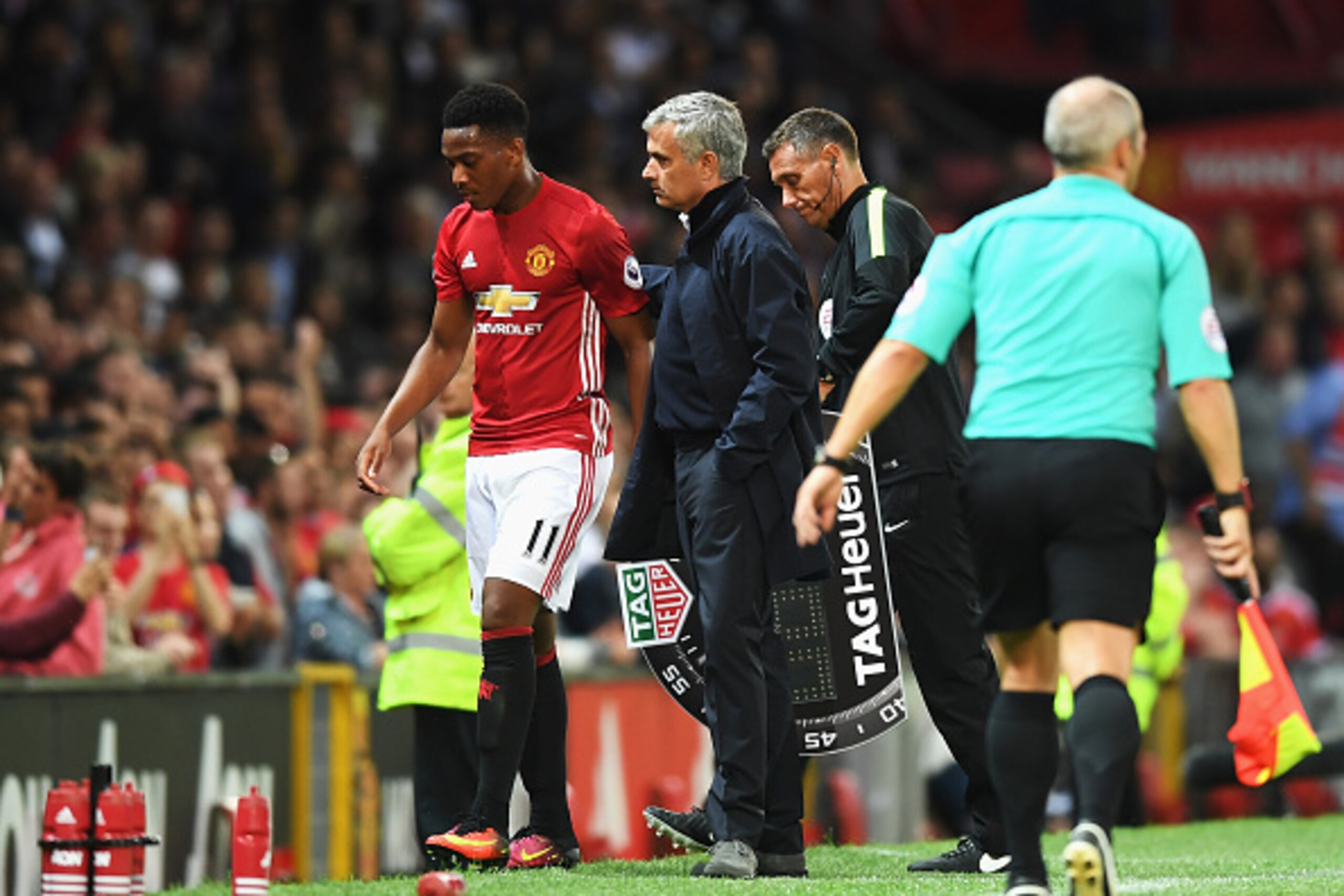 MANCHESTER, ENGLAND - AUGUST 19:  Anthony Martial of Manchester United is substituted by Jose Mourinho, Manager of Manchester United during the Premier League match between Manchester United and Southampton at Old Trafford on August 19, 2016 in Manchester