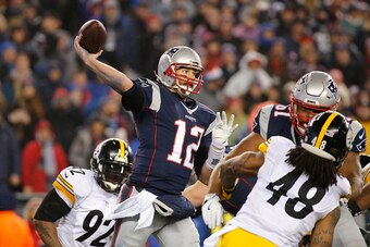 FOXBORO, MA - JANUARY 22:  Tom Brady #12 of the New England Patriots throws a pass during the second half against the Pittsburgh Steelers in the AFC Championship Game at Gillette Stadium on January 22, 2017 in Foxboro, Massachusetts.  (Photo by Jim Rogash