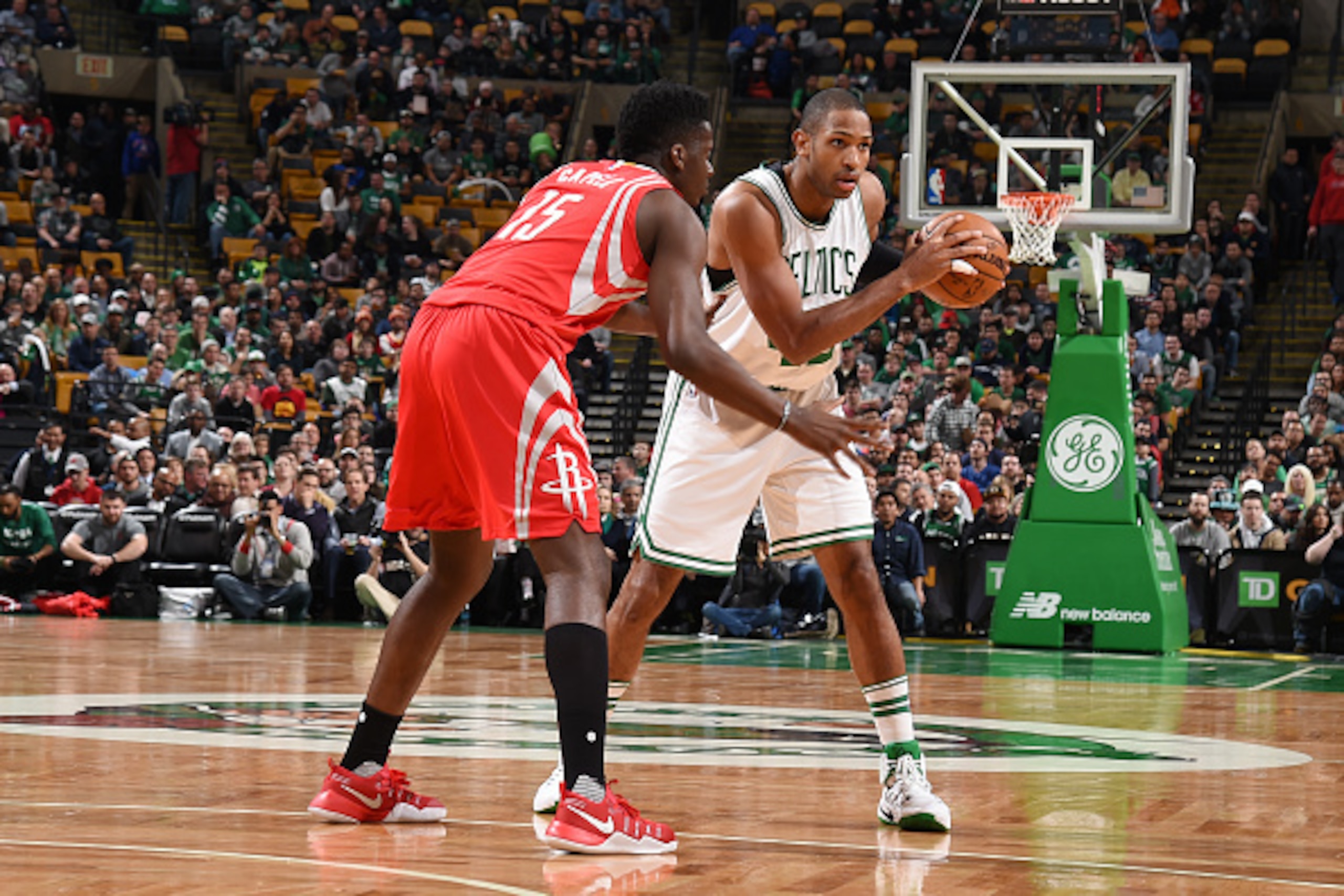 BOSTON, MA - JANUARY 25:  Al Horford #42 of the Boston Celtics  handles the ball against the Houston Rockets during the game on January 25, 2017 at the TD Garden in Boston, Massachusetts.  NOTE TO USER: User expressly acknowledges and agrees that, by down