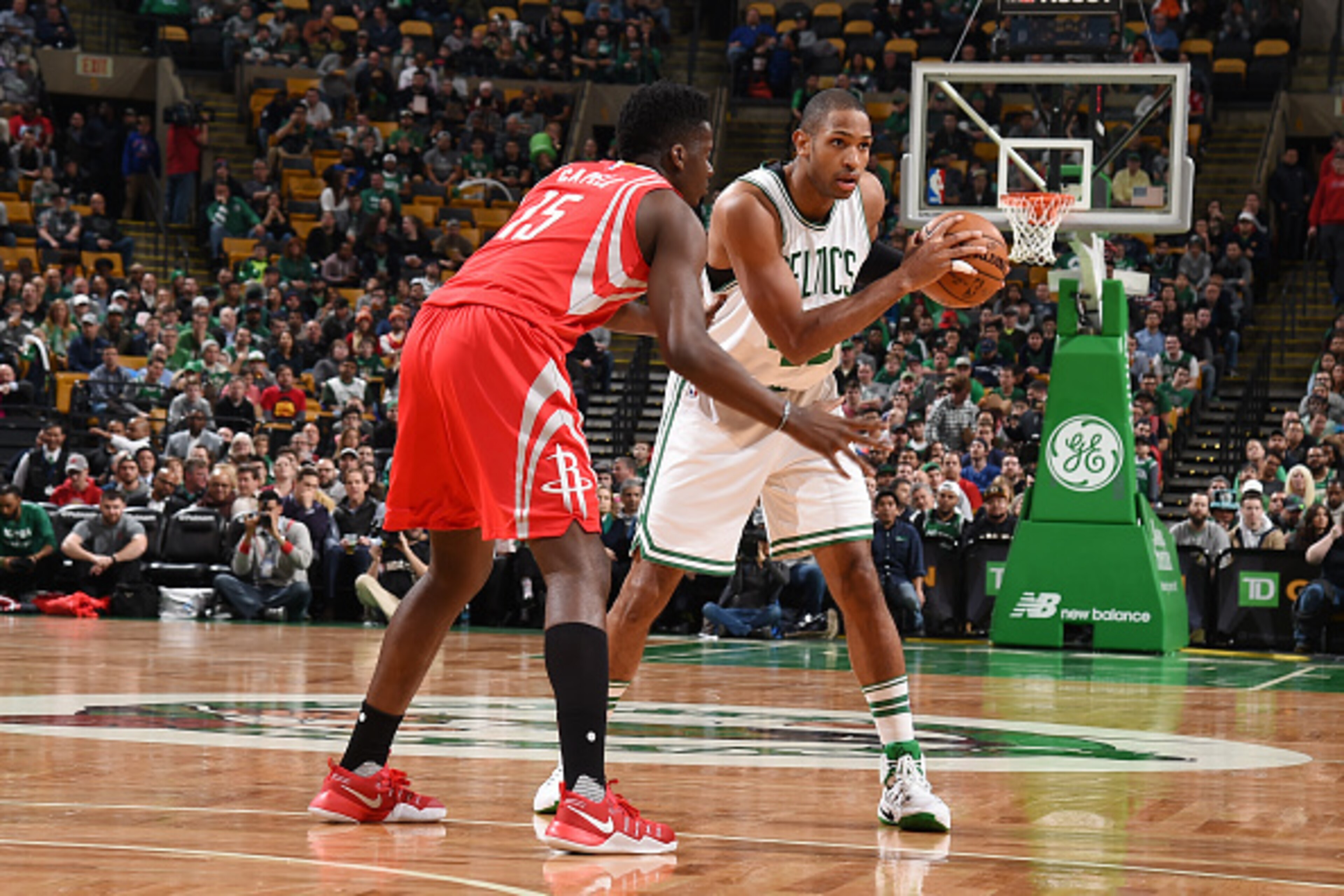BOSTON, MA - JANUARY 25:  Al Horford #42 of the Boston Celtics  handles the ball against the Houston Rockets during the game on January 25, 2017 at the TD Garden in Boston, Massachusetts.  NOTE TO USER: User expressly acknowledges and agrees that, by down