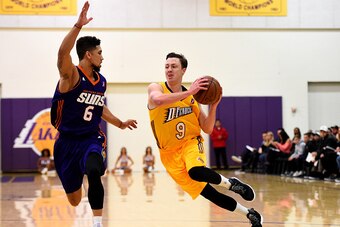 EL SEGUNDO, CA - NOVEMBER 23:  Josh Magette #9 of the Los Angeles D-Fenders drives to the basket against Askia Booker #6 of the Northern Arizona Suns on November 23, 2016 at Toyota Sports Center in El Segundo, California. NOTE TO USER: User expressly ackn