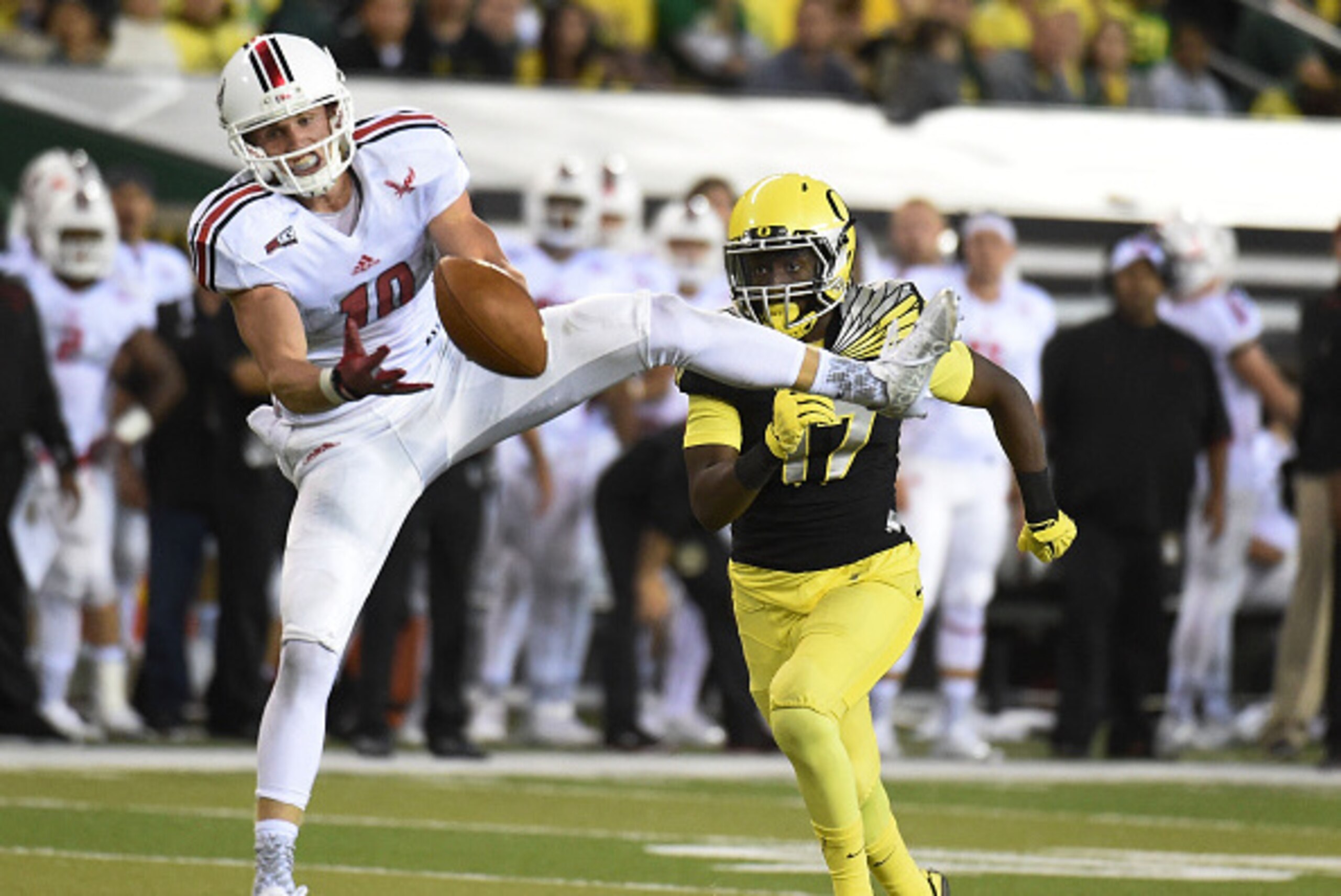 EUGENE, OR - SEPTEMBER 05:  Wide receiver Cooper Kupp #10 of the Eastern Washington Eagles can't quite hold on to the ball as safety Juwaan Williams #17 of the Oregon Ducks closes in during the fourth quarter of the game at Autzen Stadium on September 5, 