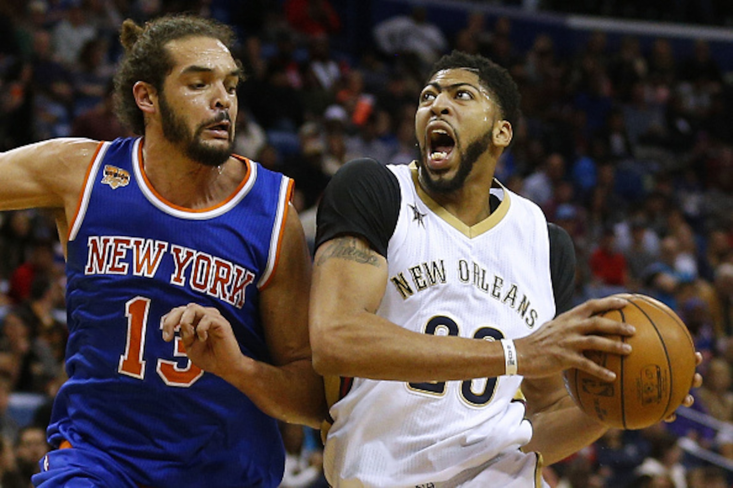 NEW ORLEANS, LA - DECEMBER 30:  Anthony Davis #23 of the New Orleans Pelicans drives against Joakim Noah #13 of the New York Knicks during a game at the Smoothie King Center on December 30, 2016 in New Orleans, Louisiana. NOTE TO USER: User expressly ackn