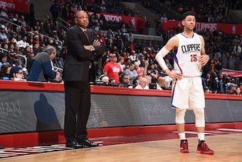 LOS ANGELES, CA - DECEMBER 04: Head Coach Doc Rivers and Austin Rivers #25 of the LA Clippers looks on during the game against the Indiana Pacers on December 04, 2016 at STAPLES Center in Los Angeles, California. NOTE TO USER: User expressly acknowledges 