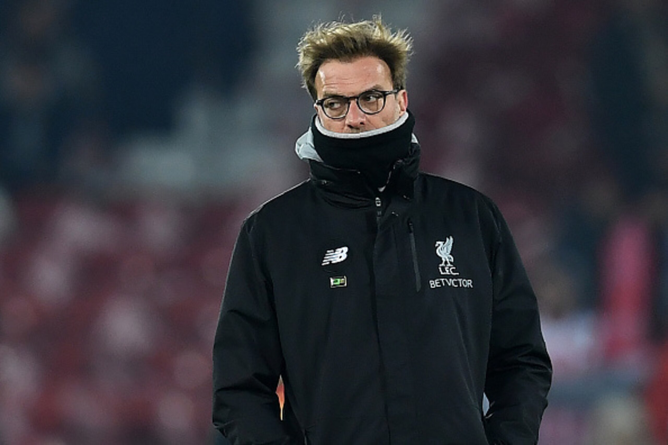 Liverpool's German manager Jurgen Klopp watches as his players warm up ahead of the EFL (English Football League) Cup semi-final second-leg football match between Liverpool and Southampton and at Anfield in Liverpool, north west England on January 25, 201