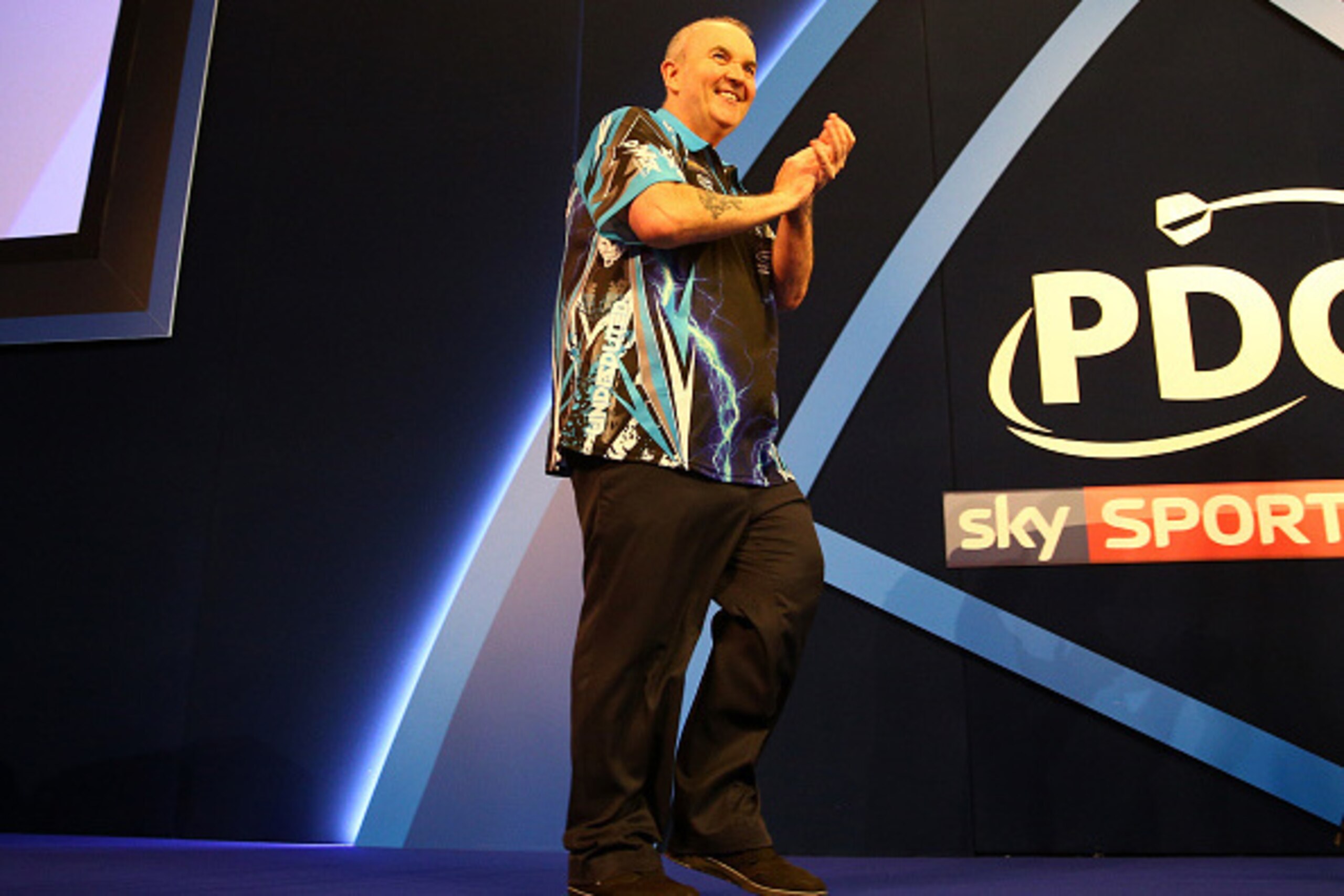 LONDON, ENGLAND - DECEMBER 18:  Phil Taylor of England greets supporters prior to his first round match against David Platt of England during Day Four of the 2017 William Hill PDC World Darts Championships  at Alexandra Palace on December 18, 2016 in Lond