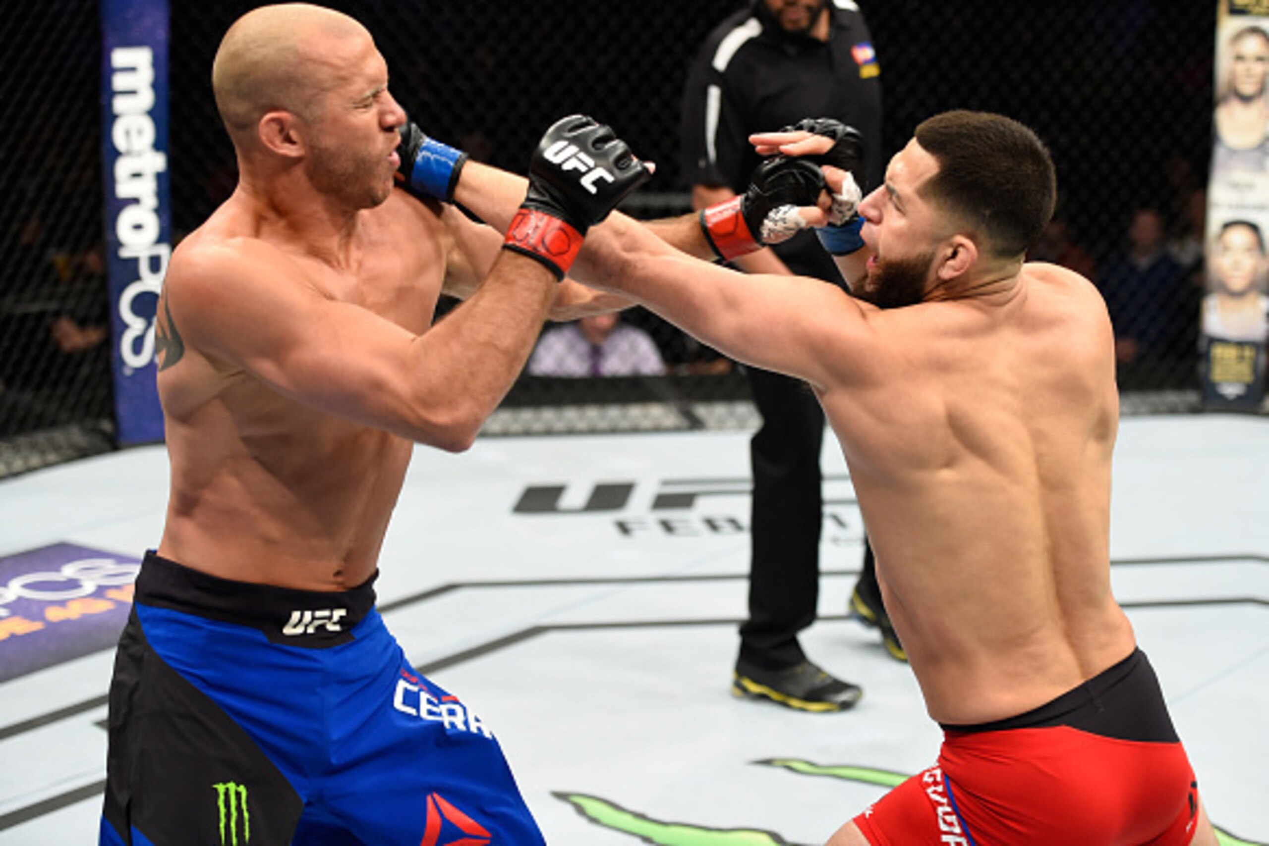 DENVER, CO - JANUARY 28:  (R-L) Jorge Masvidal punches Donald Cerrone in their welterweight bout during the UFC Fight Night event at the Pepsi Center on January 28, 2017 in Denver, Colorado. (Photo by Josh Hedges/Zuffa LLC/Zuffa LLC via Getty Images)
