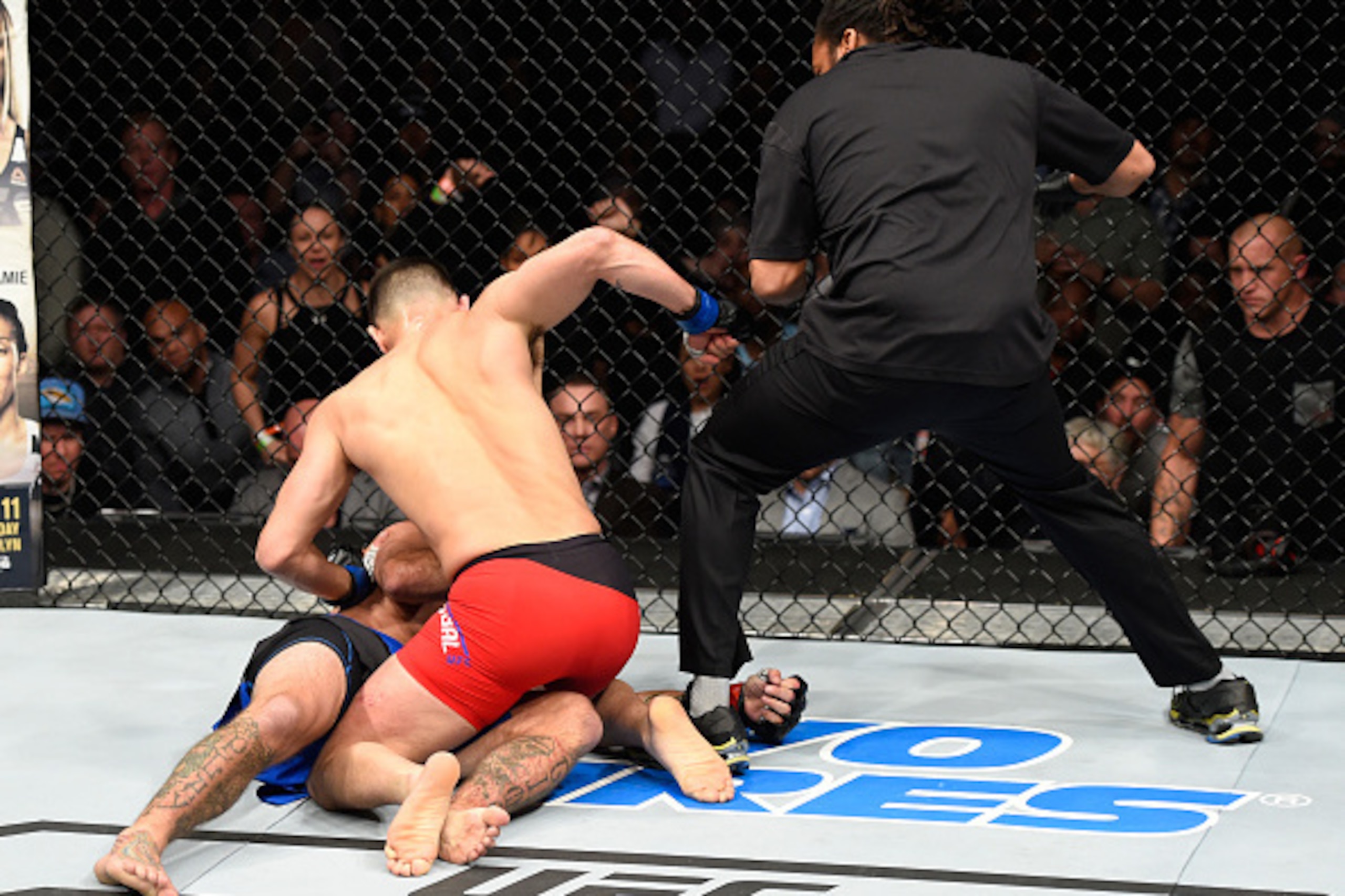 DENVER, CO - JANUARY 28:  (R-L) Jorge Masvidal punches Donald Cerrone in their welterweight bout during the UFC Fight Night event at the Pepsi Center on January 28, 2017 in Denver, Colorado. (Photo by Josh Hedges/Zuffa LLC/Zuffa LLC via Getty Images)