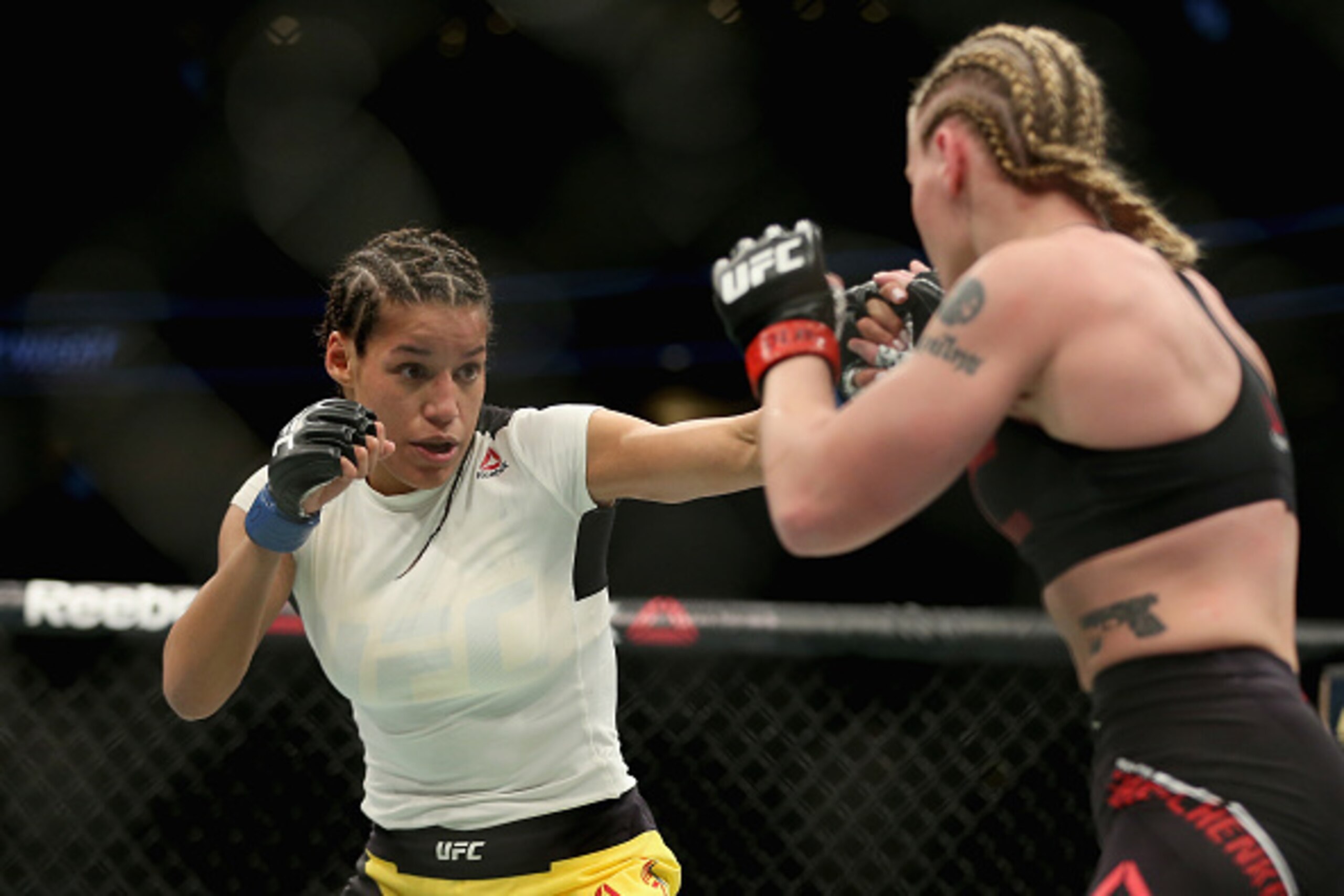 DENVER, CO - JANUARY 28: Julianna Pena fights Valentina Shevchenko of Kyrgyzstan in the women's Bantamweight division during the UFC Fight Night at the Pepsi Center on January 28, 2017 in Denver, Colorado. (Photo by Matthew Stockman/Getty Images) DENVER, CO - JANUARY 28: Julianna Pena fights Valentina Shevchenko of Kyrgyzstan in the women's Bantamweight division during the UFC Fight Night at the Pepsi Center on January 28, 2017 in Denver, Colorado. (Photo by Matthew Stockman/Getty Images)