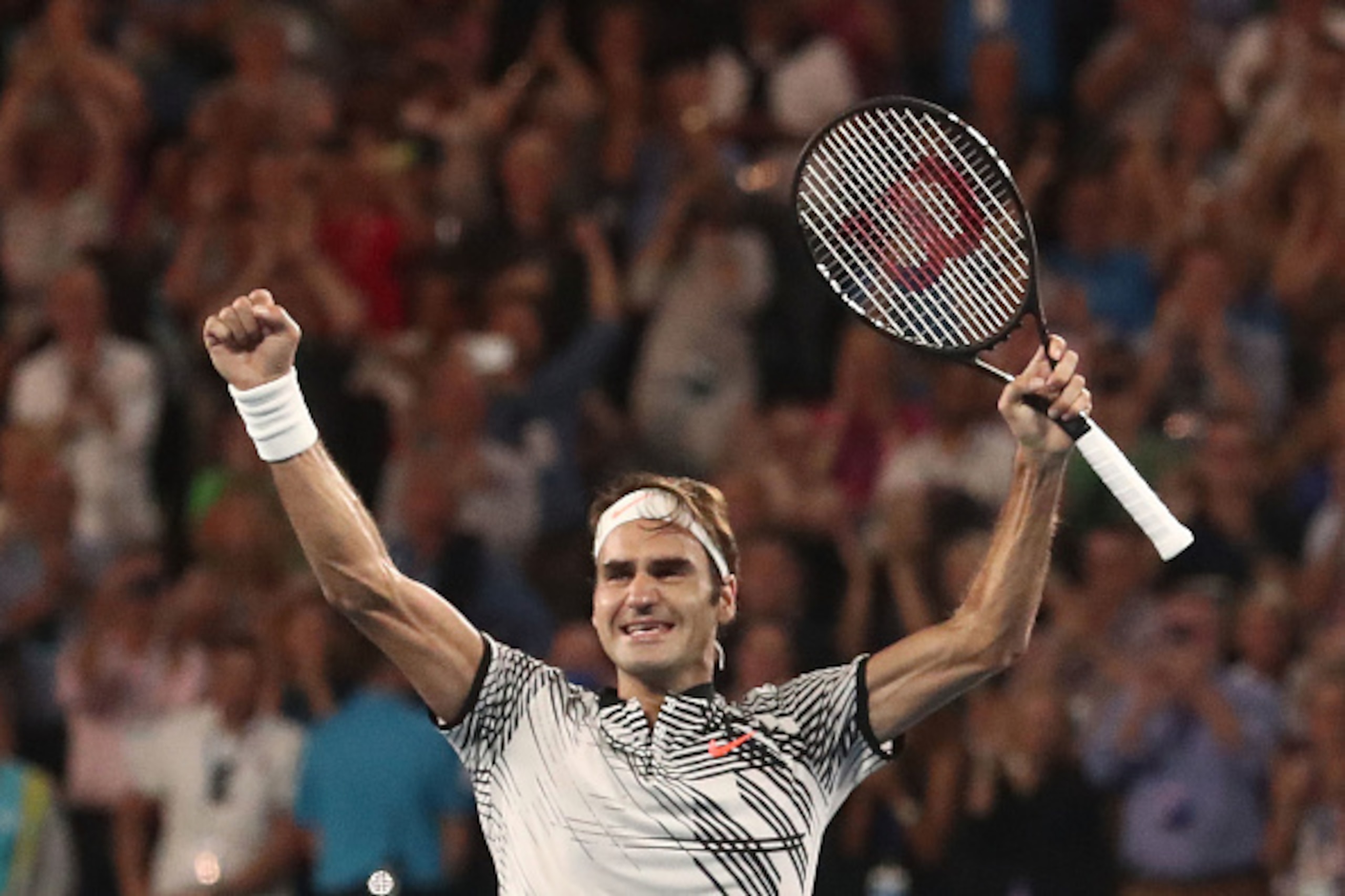 MELBOURNE, AUSTRALIA - JANUARY 29:  Roger Federer of Switzerland celebrates championship point in his Men's Final match against Rafael Nadal of Spain on day 14 of the 2017 Australian Open at Melbourne Park on January 29, 2017 in Melbourne, Australia.  (Ph