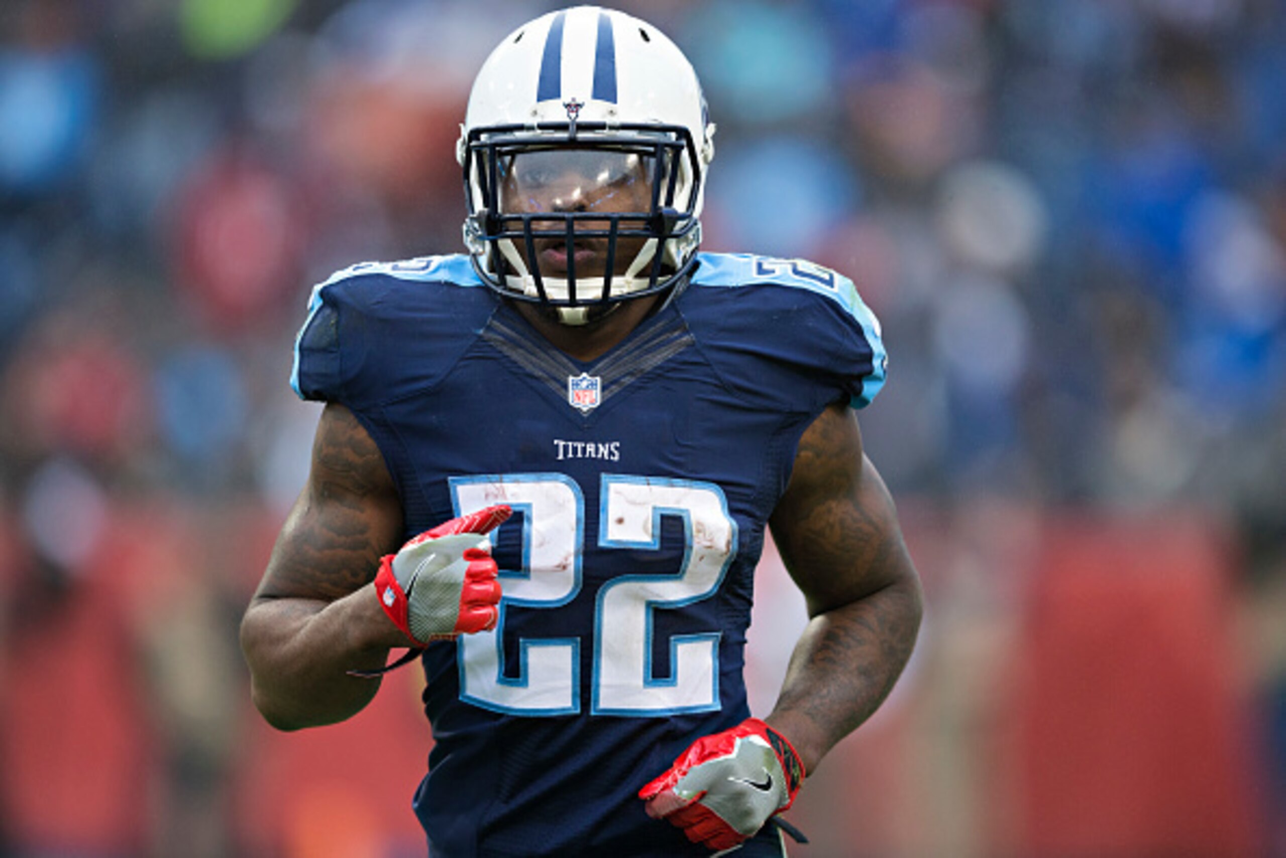 NASHVILLE, TN - JANUARY 1:  Derrick Henry #22 of the Tennessee Titans jogs off the field during a game against the Houston Texans at Nissan Stadium on January 1, 2017 in Nashville, Tennessee.  The Titans defeated the Texans 24-17.  (Photo by Wesley Hitt/G