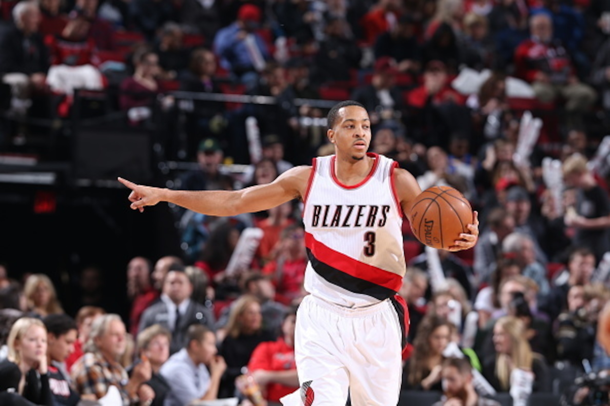 PORTLAND, OR - DECEMBER 26:  C.J. McCollum #3 of the Portland Trail Blazers controls the ball against the Toronto Raptors during the game on December 26, 2016 at the Moda Center in Portland, Oregon. NOTE TO USER: User expressly acknowledges and agrees tha