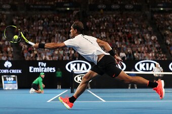 MELBOURNE, AUSTRALIA - JANUARY 29:  Rafael Nadal of Spain plays a forehand in his Men's Final match against Roger Federer of Switzerland on day 14 of the 2017 Australian Open at Melbourne Park on January 29, 2017 in Melbourne, Australia.  (Photo by Scott 