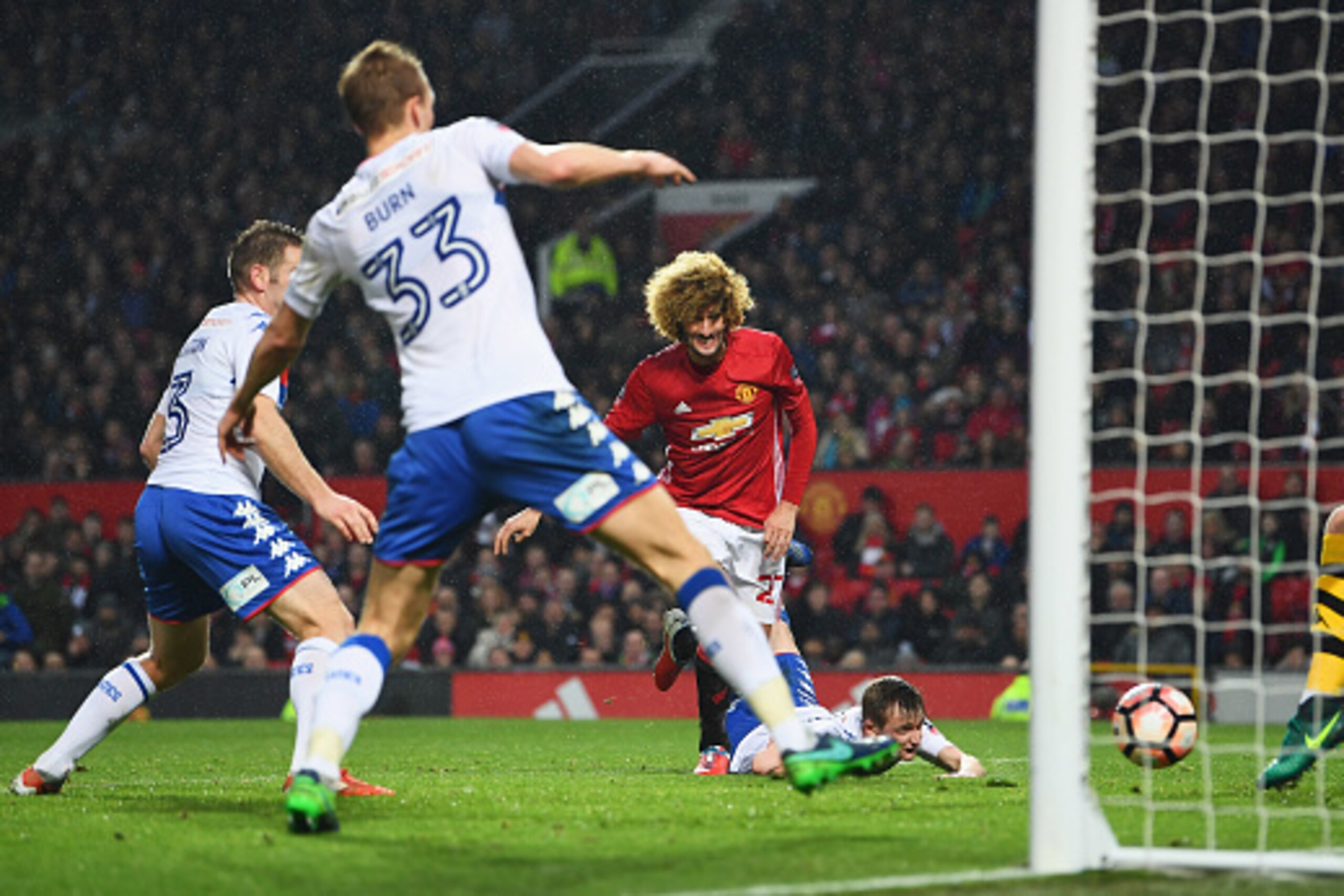 MANCHESTER, ENGLAND - JANUARY 29:  Marouane Fellaini of Manchester United (C) scores their first goal during the Emirates FA Cup Fourth round match between Manchester United and Wigan Athletic at Old Trafford on January 29, 2017 in Manchester, England.  (