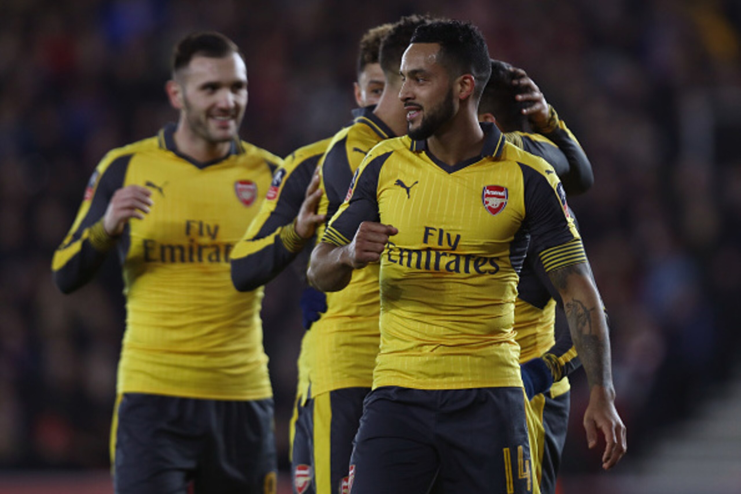 SOUTHAMPTON, ENGLAND - JANUARY 28:  Theo Walcott of Arsenal celebrates with team mates after scoring his sides fourth goal during the Emirates FA Cup Fourth Round match between Southampton and Arsenal at St Mary's Stadium on January 28, 2017 in Southampto