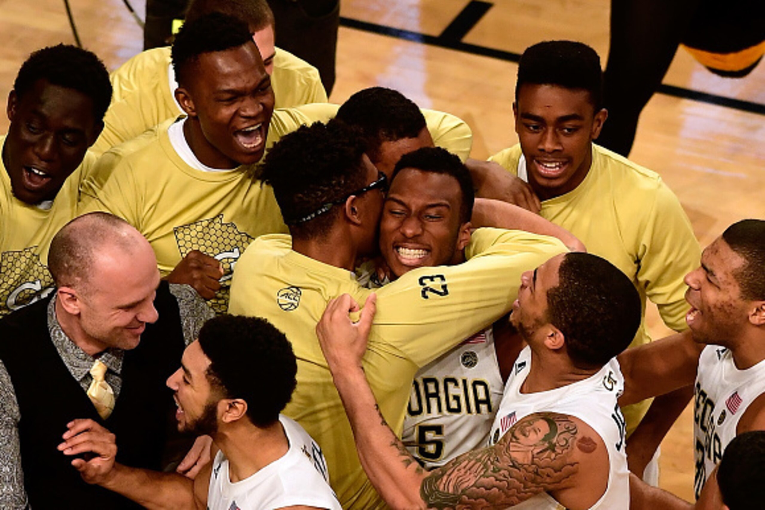 ATLANTA, GA - JANUARY 28:  The Georgia Tech Yellow Jackets surround Josh Okogie #5 of the Georgia Tech Yellow Jackets in celebration following the Yellow Jackets' win over the Notre Dame Fighting Irish at Hank McCamish Pavilion on January 28, 2017 in Atla