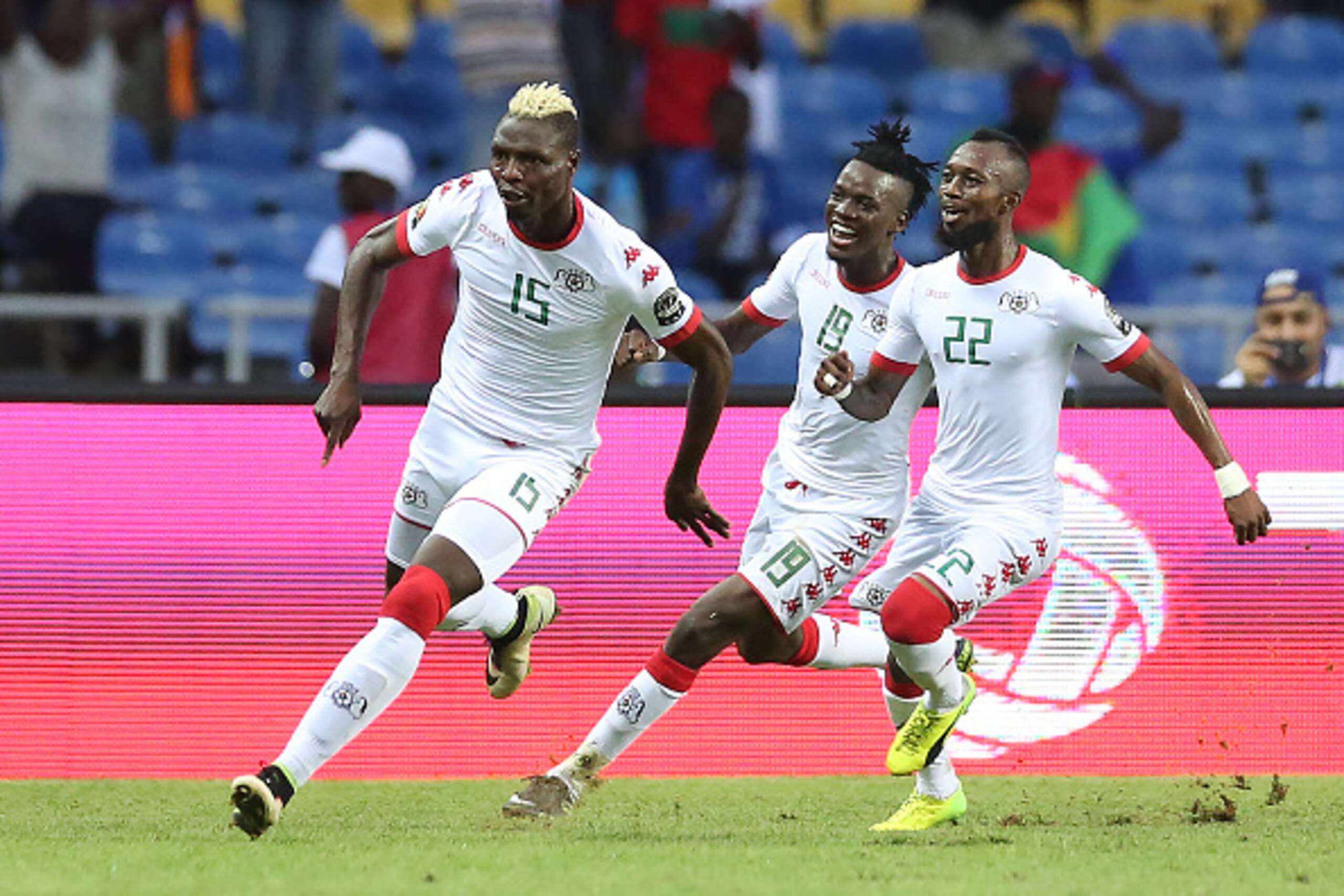 Burkina Faso's forward Aristide Bance (L) celebrates with teammates after scoring a goal during the 2017 Africa Cup of Nations quarter-final football match between Burkina Faso and Tunisia at the Stade de l'Amitie Sino-Gabonaise in Libreville on January 2