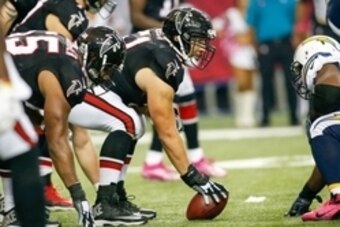 Oct 23, 2016; Atlanta, GA, USA; Atlanta Falcons center Alex Mack (51) over center against the San Diego Chargers in the third quarter at the Georgia Dome. The Chargers defeated the Falcons 33-30 in overtime. Mandatory Credit: Brett Davis-USA TODAY Sports