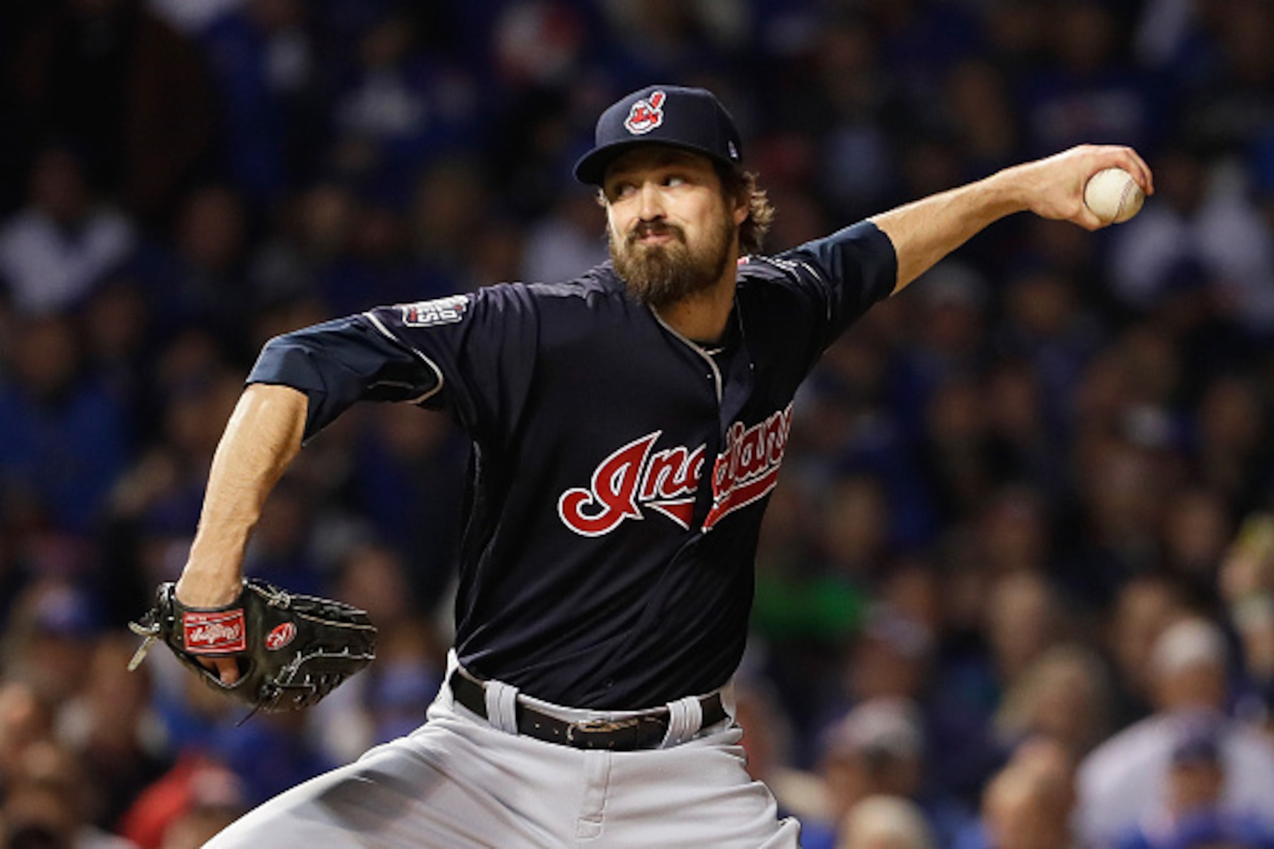CHICAGO, IL - OCTOBER 28:  Andrew Miller #24 of the Cleveland Indians pitches in the fifth inning against the Chicago Cubs in Game Three of the 2016 World Series at Wrigley Field on October 28, 2016 in Chicago, Illinois.  (Photo by Jamie Squire/Getty Imag