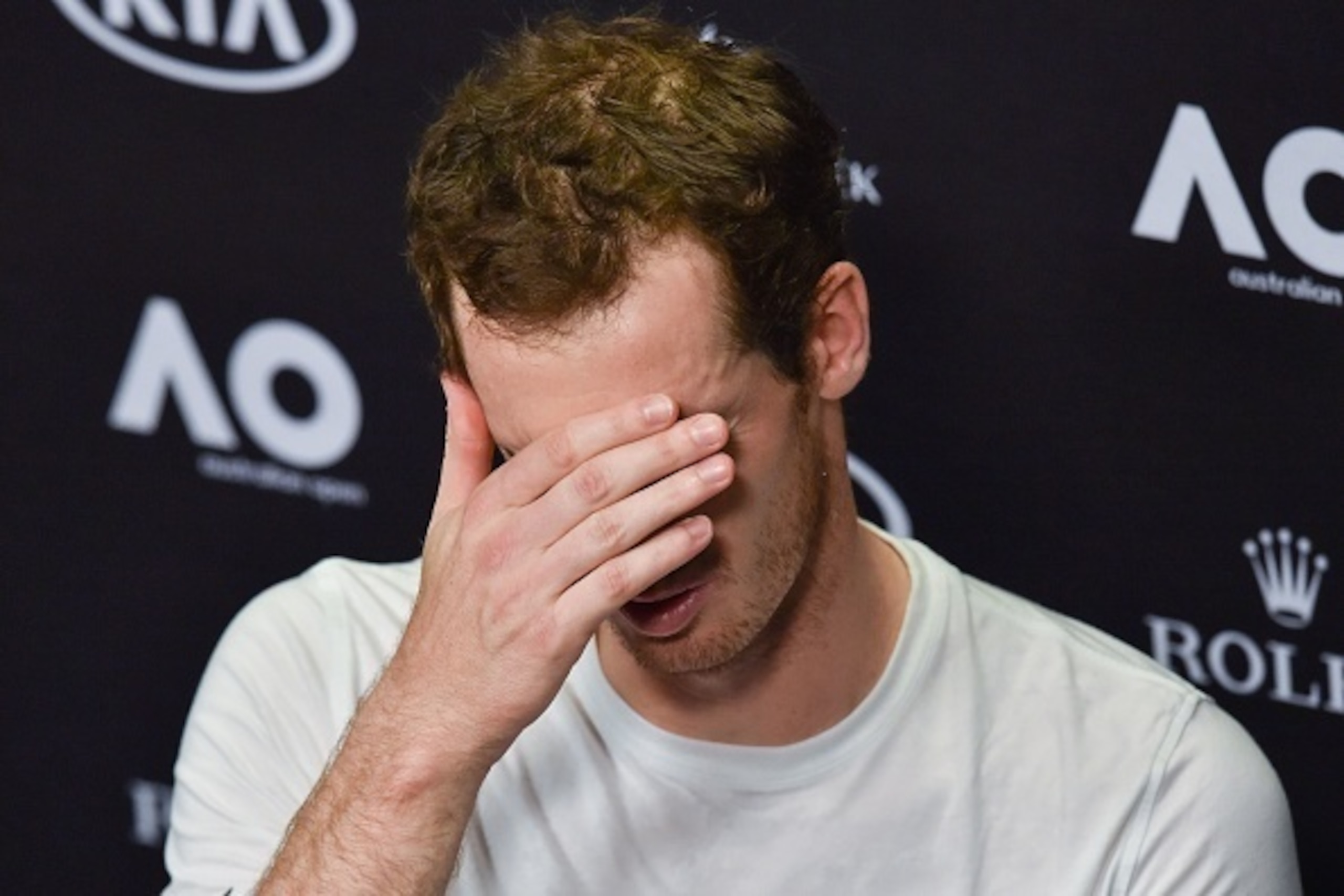 Britain's Andy Murray speaks during a press conference after his defeat against Germany's Mischa Zverev during their men's singles fourth round match on day seven of the Australian Open tennis tournament in Melbourne on January 22, 2017. / AFP / PAUL CROC