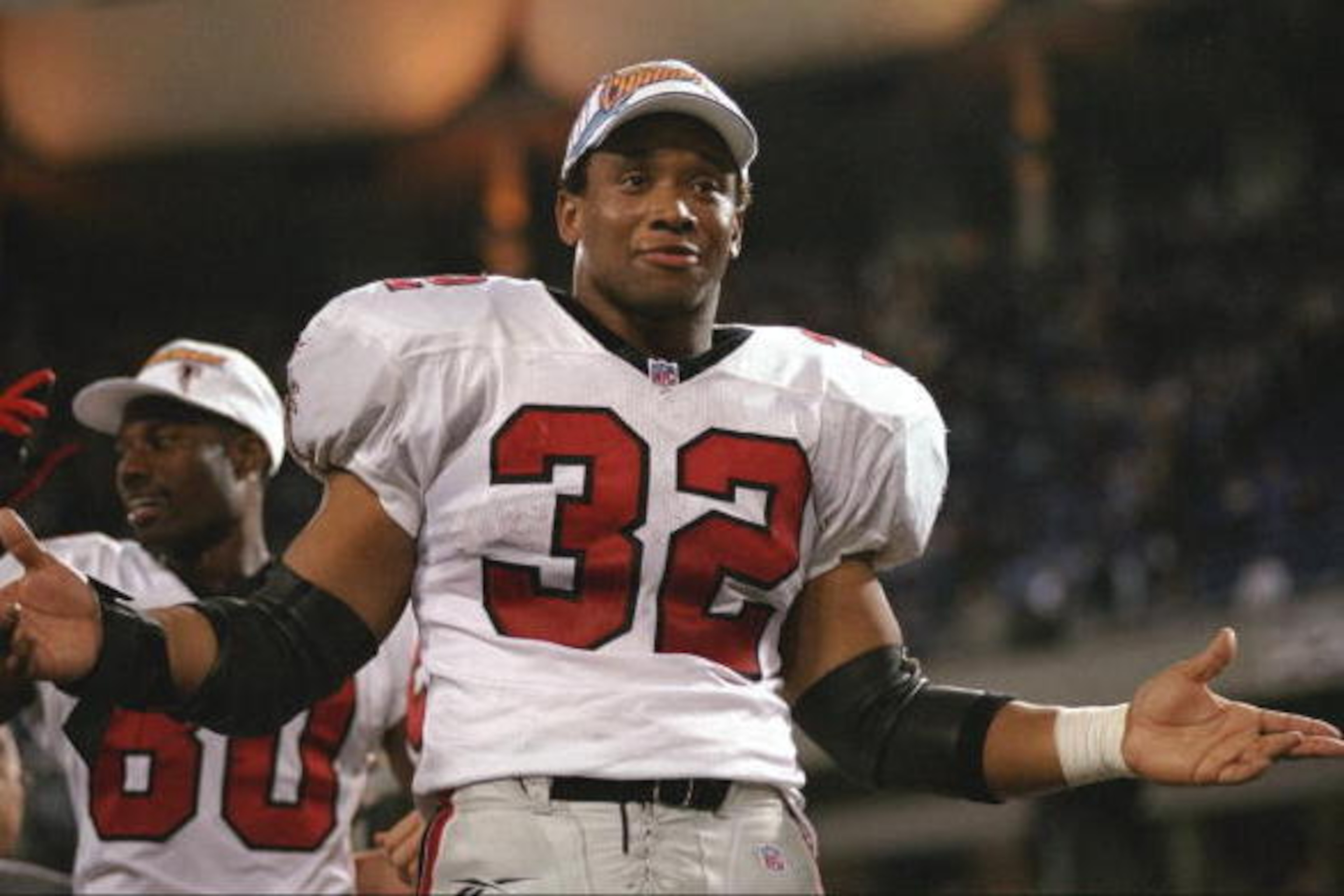 17 Jan 1999: Jamal Anderson #32 of the Atlanta Falcons celebrates after winning the NFC Championship Game against the Minnesota Vikings at the H. H. H. Metrodome in Minneapolis, Minnesota. The Falcons defeated the Vikings 30-27 in overtime. Mandatory Cre 17 Jan 1999: Jamal Anderson #32 of the Atlanta Falcons celebrates after winning the NFC Championship Game against the Minnesota Vikings at the H. H. H. Metrodome in Minneapolis, Minnesota. The Falcons defeated the Vikings 30-27 in overtime. Mandatory Cre