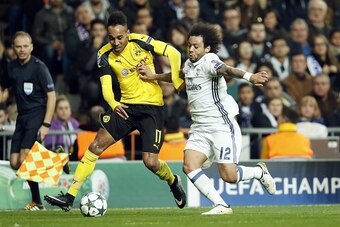 (L-R) Pierre-Emerick Aubameyang of Borussia Dortmund, Marcelo of Real Madridduring the UEFA Champions League group F match between  Real Madrid and Borussia Dortmund on December 07, 2016 at the Santiago Bernabeu stadium in Madrid, Spain.(Photo by VI Image