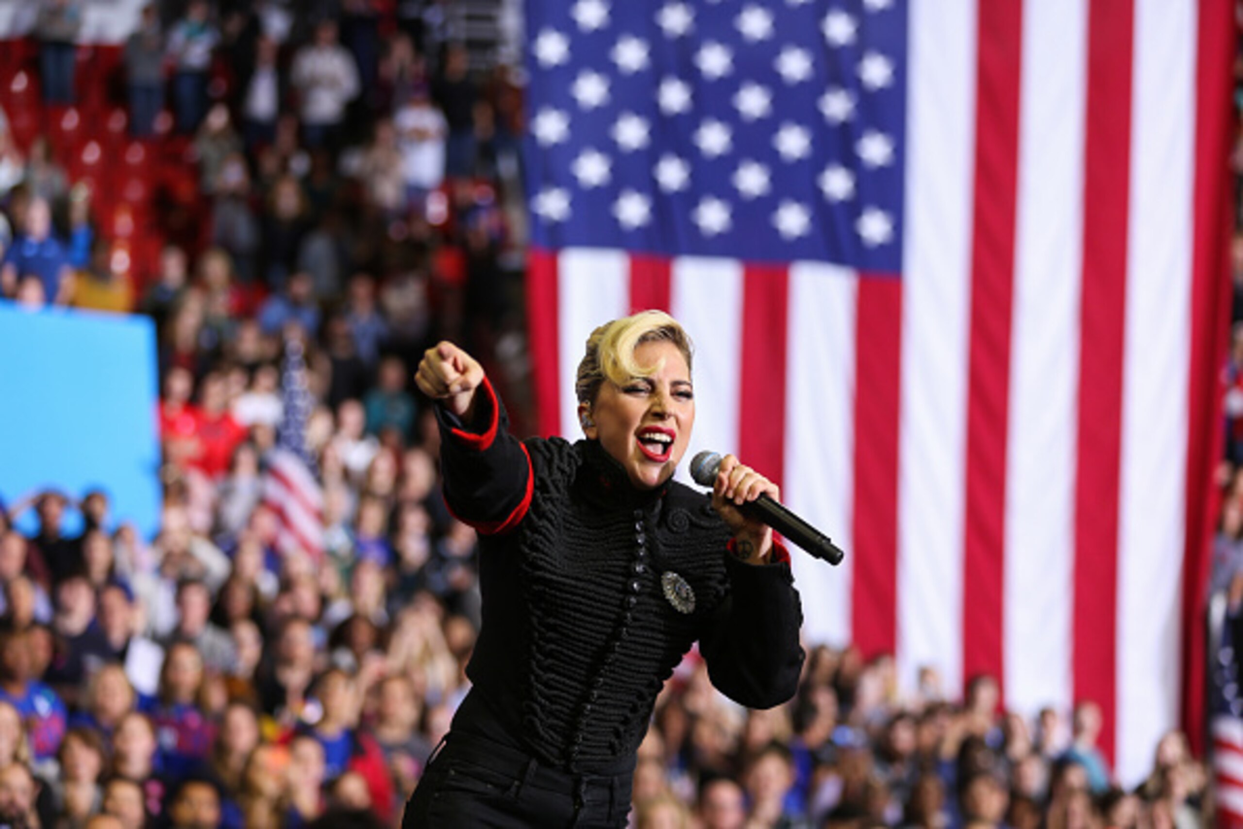 TOPSHOT - Lady Gaga performs inside the Reynolds Coliseum on the campus of North Carolina State University for the final campaign stop of the Clinton campaign before election day, in Raleigh, North Carolina, on November 7, 2016.
Hillary Clinton and Donald