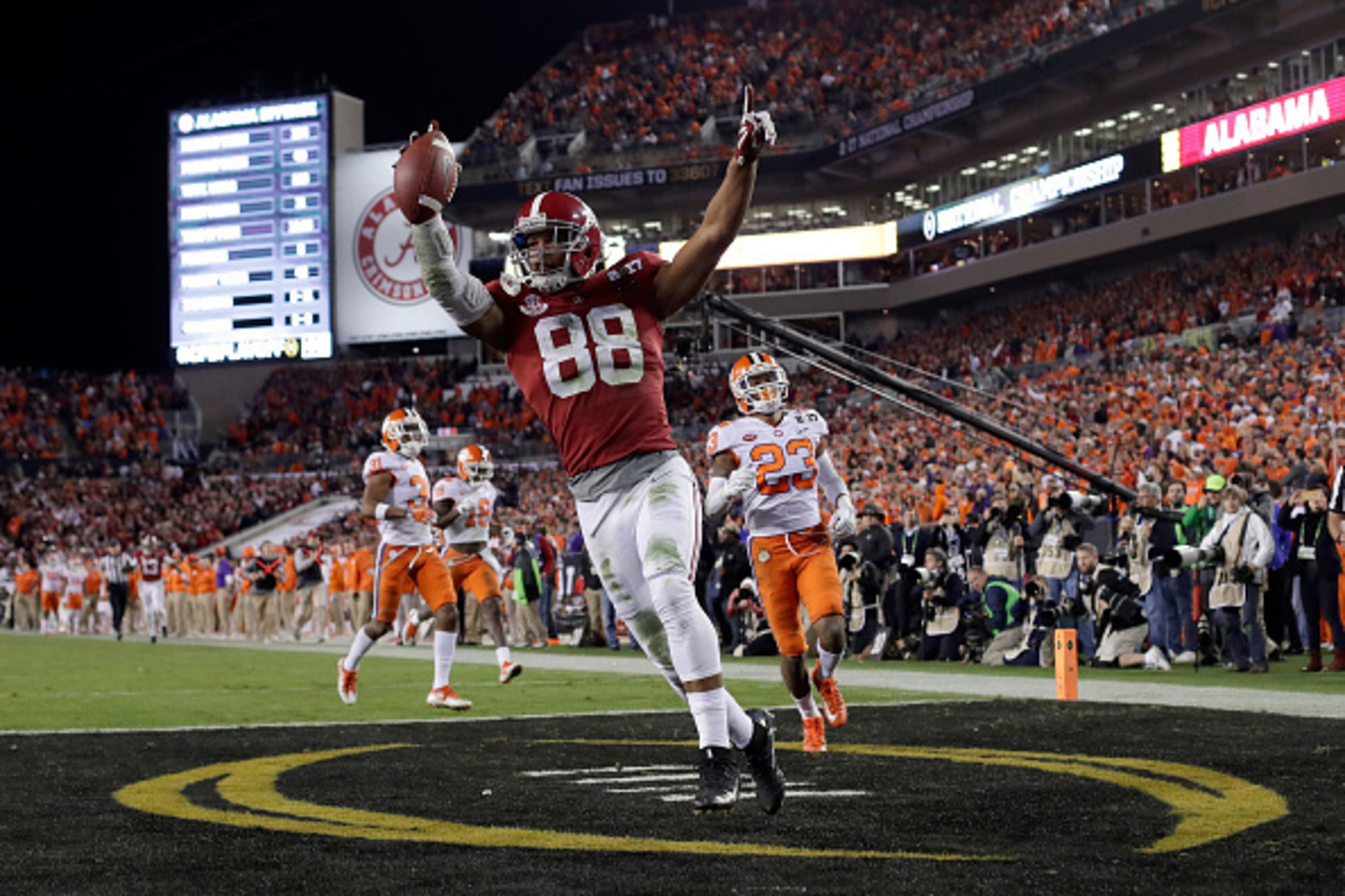 TAMPA, FL - JANUARY 09:  Tight end O.J. Howard #88 of the Alabama Crimson Tide celebrates after scoring a 68-yard touchdown during the third quarter against the Clemson Tigers in the 2017 College Football Playoff National Championship Game at Raymond Jame