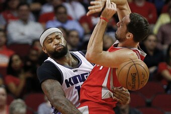 HOUSTON, TX - JANUARY 31:  DeMarcus Cousins #15 of the Sacramento Kings and Ryan Anderson #3 of the Houston Rockets collide at Toyota Center on January 31, 2017 in Houston, Texas. NOTE TO USER: User expressly acknowledges and agrees that, by downloading a