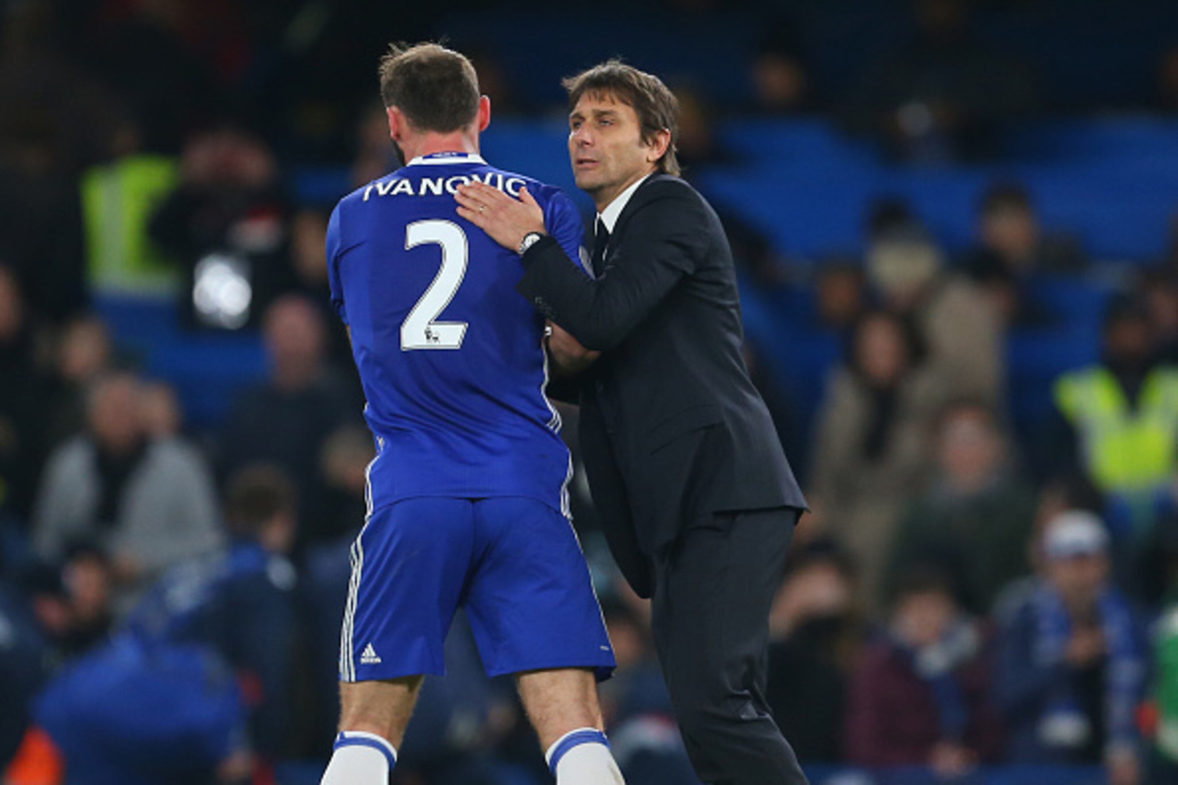 LONDON, ENGLAND - DECEMBER 31: Antonio Conte manager / head coach of Chelsea and Branislav Ivanovic of Chelsea after the Premier League match between Chelsea and Stoke City at Stamford Bridge on December 31, 2016 in London, England. (Photo by Catherine Iv