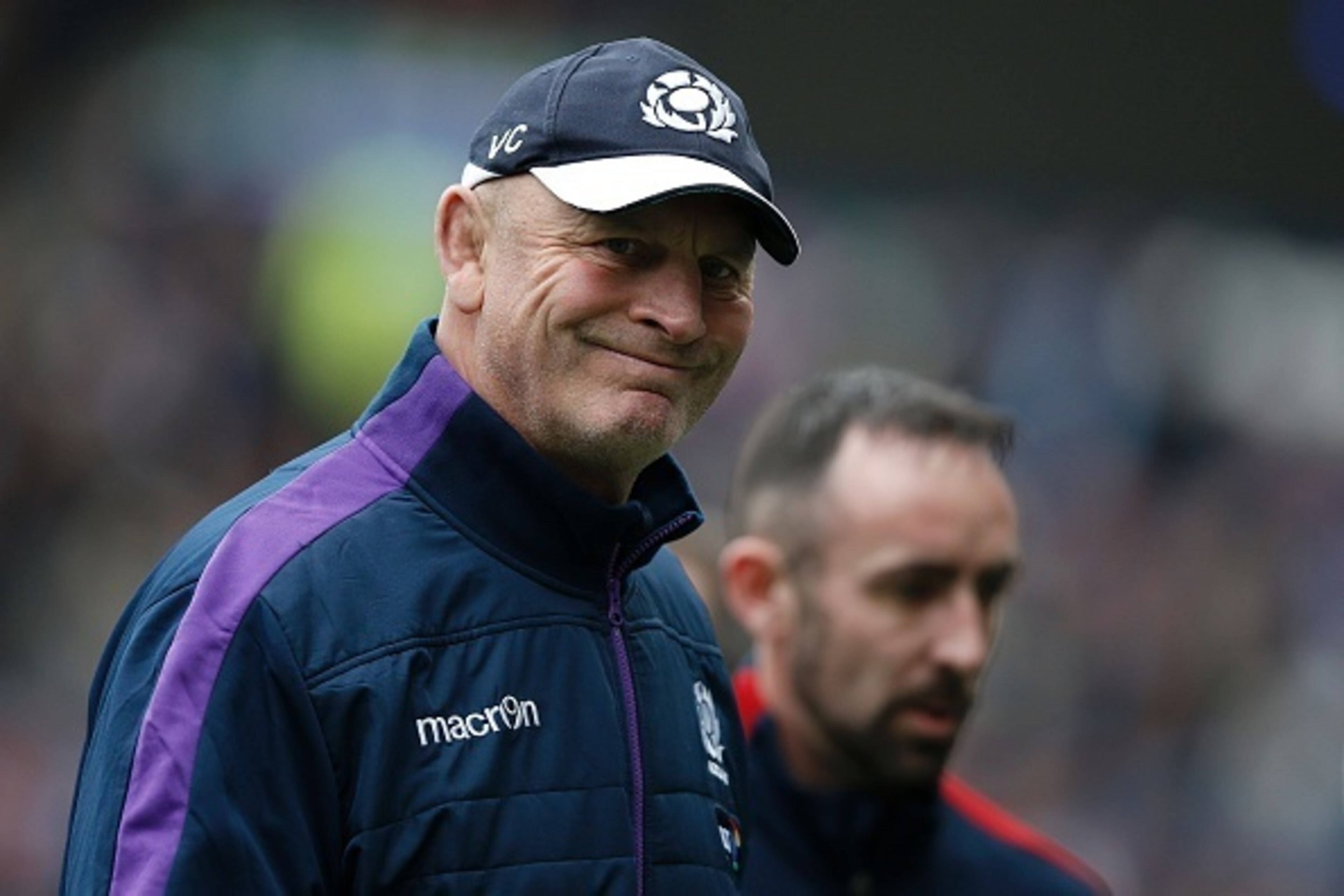 Scotland's New Zealand head coach Vern Cotter (L) arrives on the pitch ahead of the Six Nations international rugby union match between Scotland and France at Murrayfield in Edinburgh, Scotland on March 13, 2016.   / AFP / ADRIAN DENNIS        (Photo cred