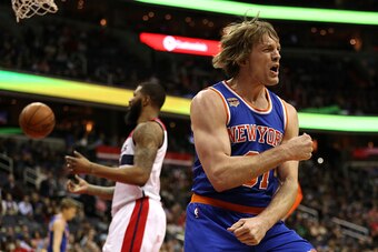 WASHINGTON, DC - JANUARY 31: Ron Baker #31 of the New York Knicks reacts after being fouled and scoring a basket against the Washington Wizards during the first half at Verizon Center on January 31, 2017 in Washington, DC. NOTE TO USER: User expressly ack