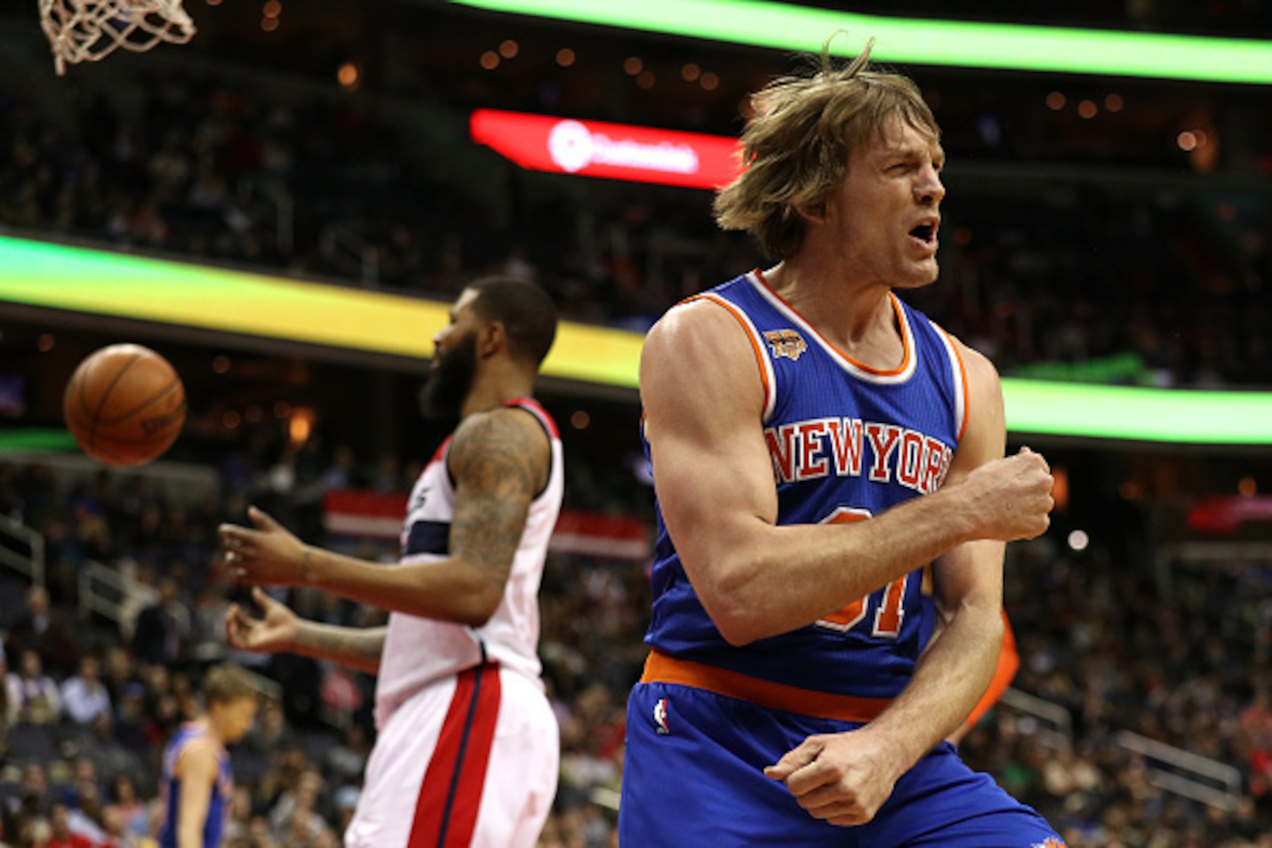 WASHINGTON, DC - JANUARY 31: Ron Baker #31 of the New York Knicks reacts after being fouled and scoring a basket against the Washington Wizards during the first half at Verizon Center on January 31, 2017 in Washington, DC. NOTE TO USER: User expressly ack