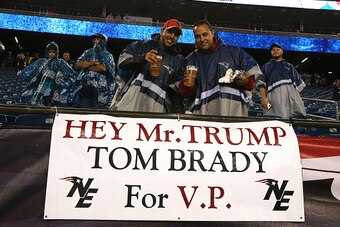 FOXBORO, MA - SEPTEMBER 10: Fans stand with a sign stating 'Hey Mr. Trump Tom Brady for V.P.' before the game between the New England Patriots and the Pittsburgh Steelers at Gillette Stadium on September 10, 2015 in Foxboro, Massachusetts.  (Photo by Jim 