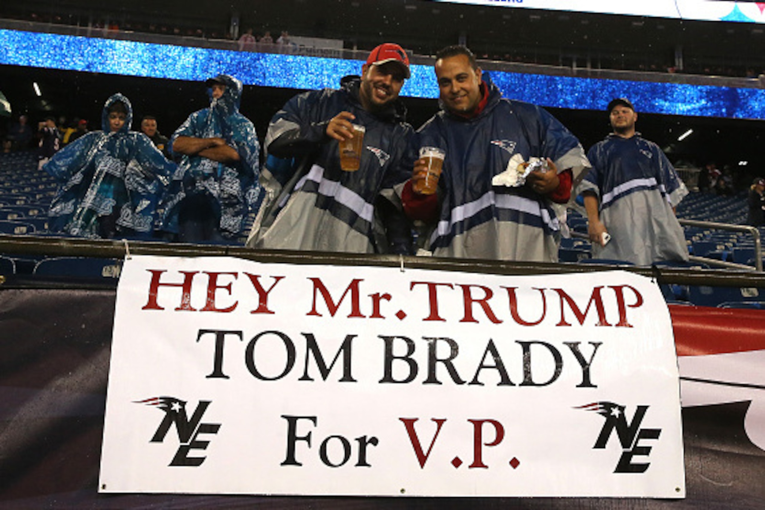 FOXBORO, MA - SEPTEMBER 10: Fans stand with a sign stating 'Hey Mr. Trump Tom Brady for V.P.' before the game between the New England Patriots and the Pittsburgh Steelers at Gillette Stadium on September 10, 2015 in Foxboro, Massachusetts. (Photo by Jim FOXBORO, MA - SEPTEMBER 10: Fans stand with a sign stating 'Hey Mr. Trump Tom Brady for V.P.' before the game between the New England Patriots and the Pittsburgh Steelers at Gillette Stadium on September 10, 2015 in Foxboro, Massachusetts. (Photo by Jim