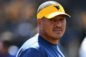 MORGANTOWN, WV - SEPTEMBER 10:  Assistant coach Ja'Juan Seider of the West Virginia Mountaineers looks on during warmups prior to the game against the Youngstown State Penguins at Mountaineer Field on September 10, 2016 in Morgantown, West Virginia. (Phot