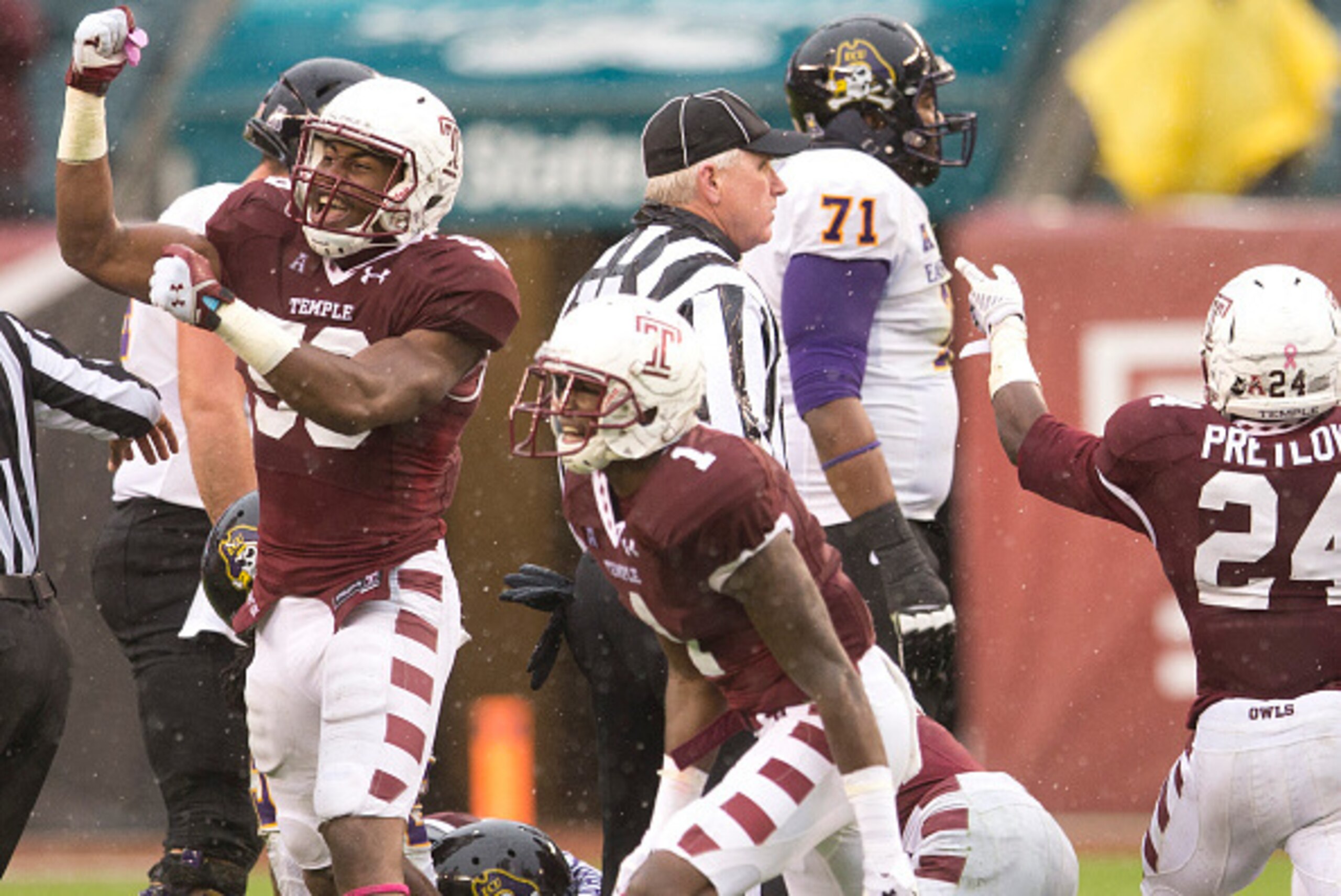 PHILADELPHIA, PA - NOVEMBER 1: Haason Reddick #58 and Tavon Young #1 of the Temple Owls react after the Owls recovered a fumble in the first half against the East Carolina Pirates on November 1, 2014 at Lincoln Financial Field in Philadelphia, Pennsylvani