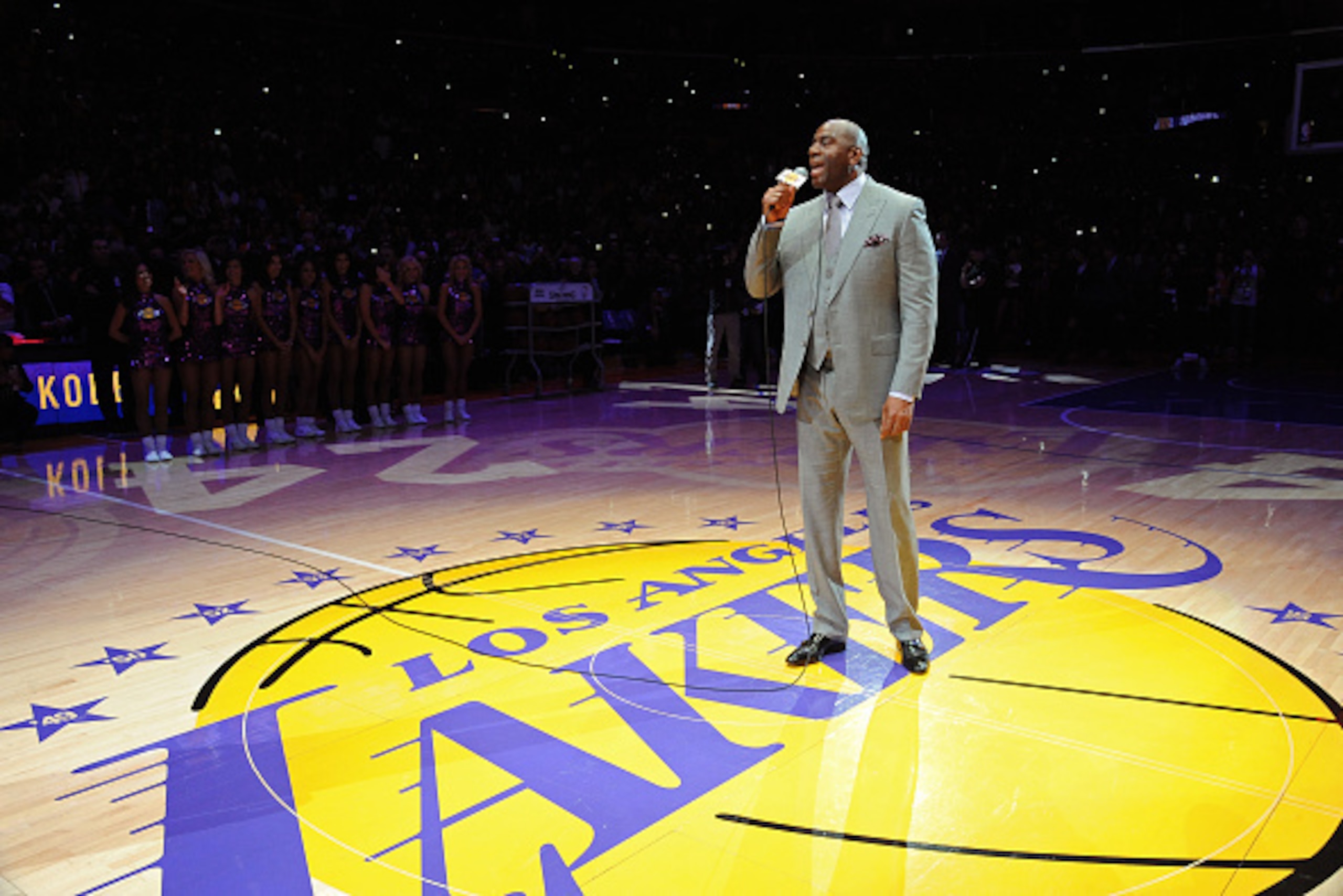 LOS ANGELES, CA - APRIL 13:  NBA Legend, Magic Johnson announces Kobe Bryant #24 of the Los Angeles Lakers before his last game against the Utah Jazz on April 13, 2016 at Staples Center in Los Angeles, California. NOTE TO USER: User expressly acknowledges